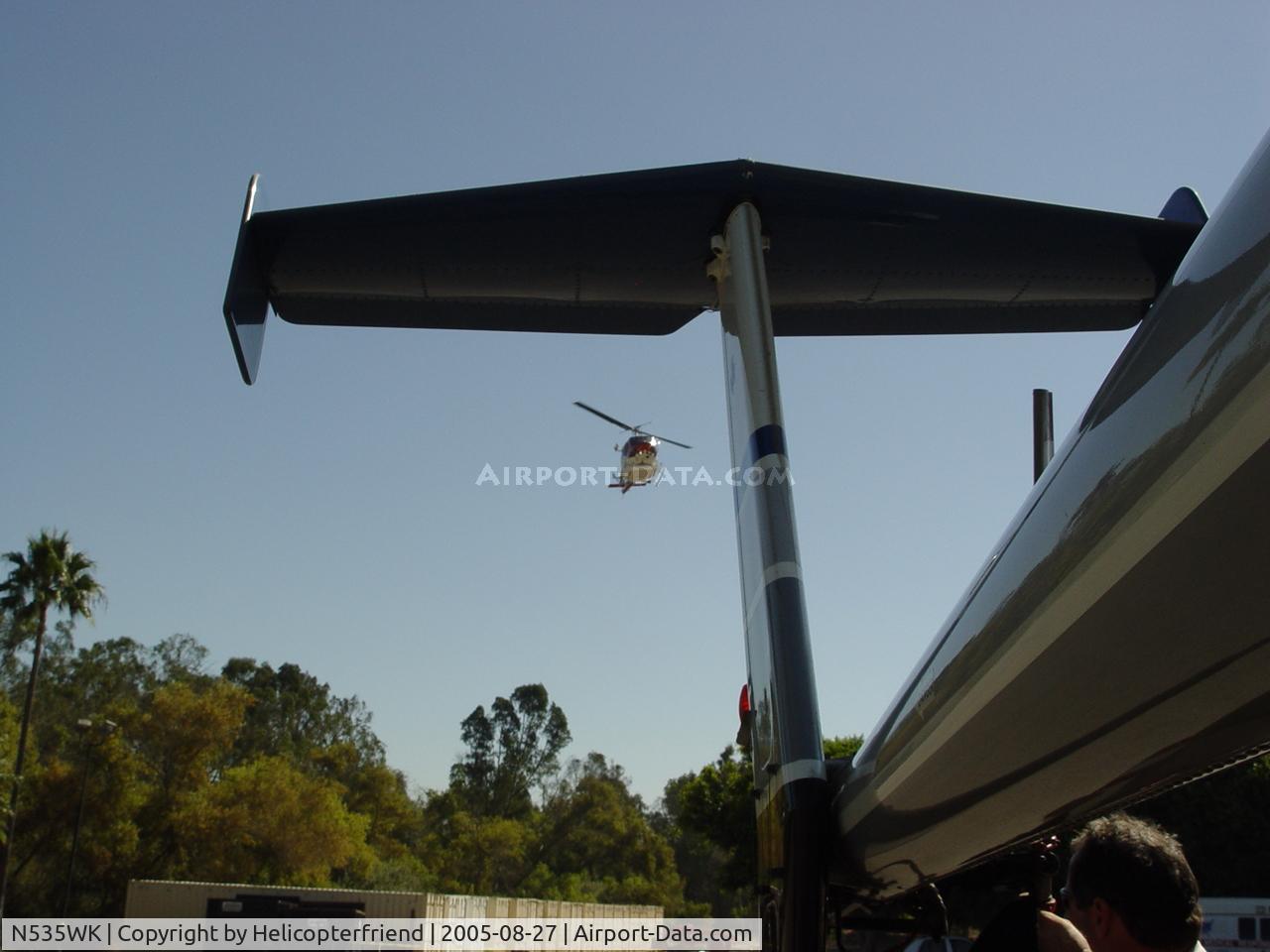 N535WK, MD Helicopters 369FF C/N 0138FF, Holding tail rotor while FD Bell 212 lands for display