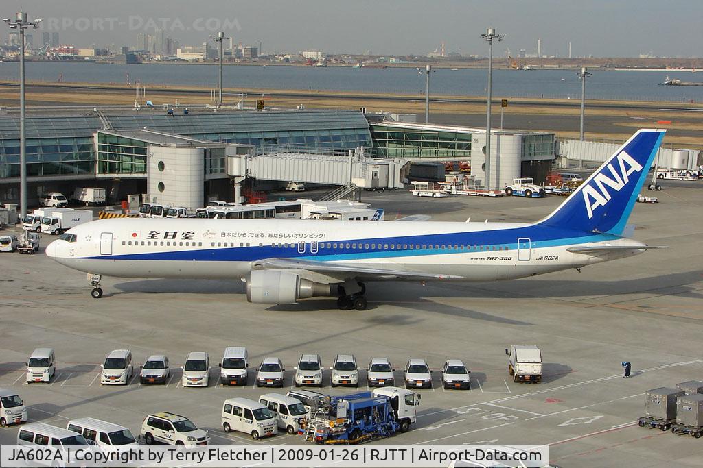 JA602A, 1997 Boeing 767-381 C/N 27944, ANA B767 taxies onto stand at Haneda
