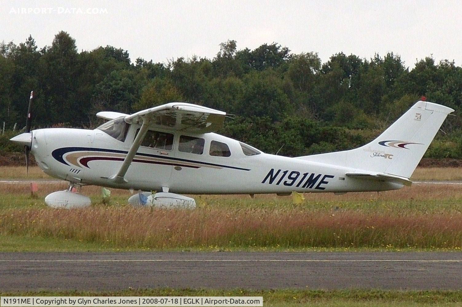 N191ME, 2000 Cessna T206H Turbo Stationair C/N T20608188, The outfield long grass covering the wheels. Owned by Low Desert Aviation Inc Trustee.