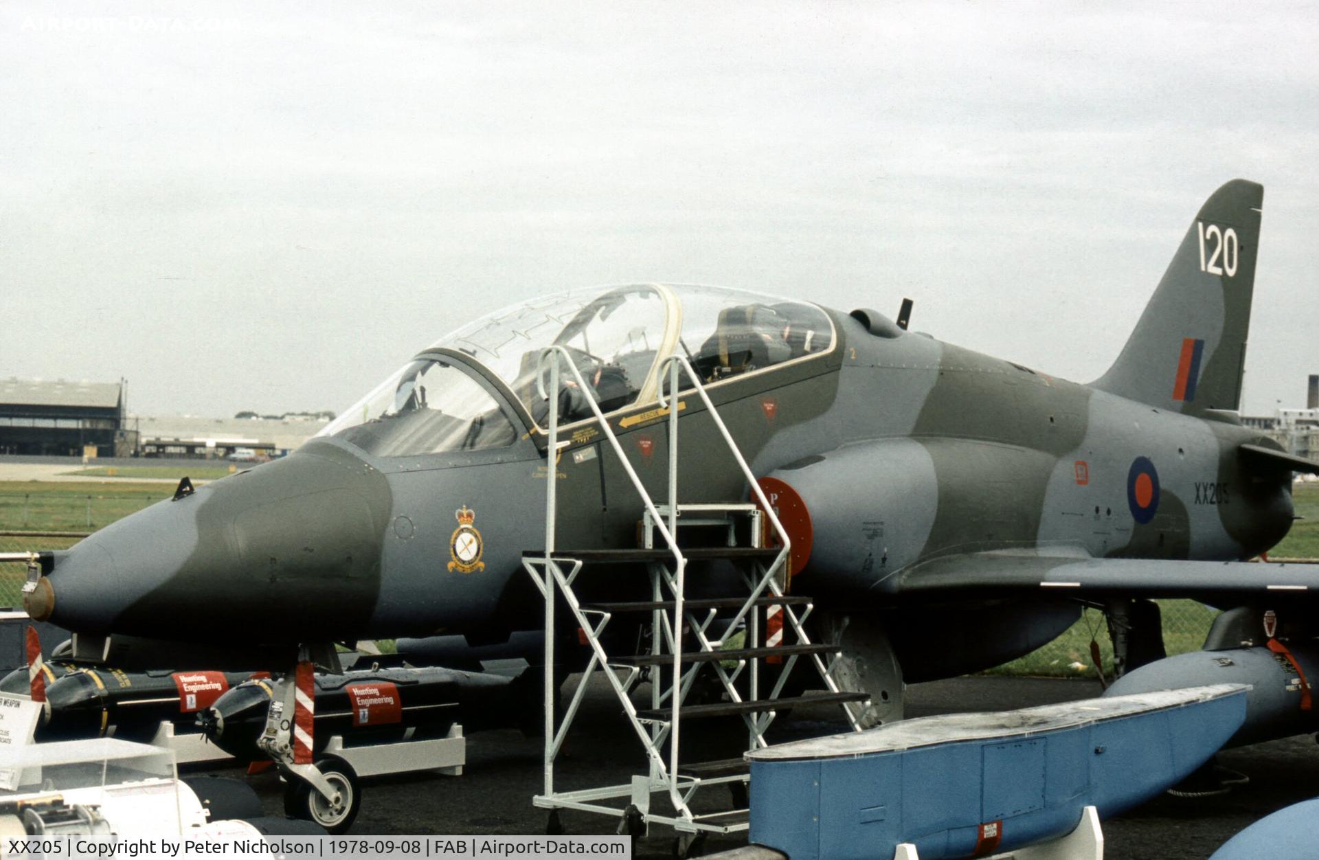 XX205, 1978 Hawker Siddeley Hawk T.1 C/N 052/312052, Mixed weapons load around this Tactical Weapons Unit Hawk T.1 as displayed at the 1978 Farnborough Air Show.