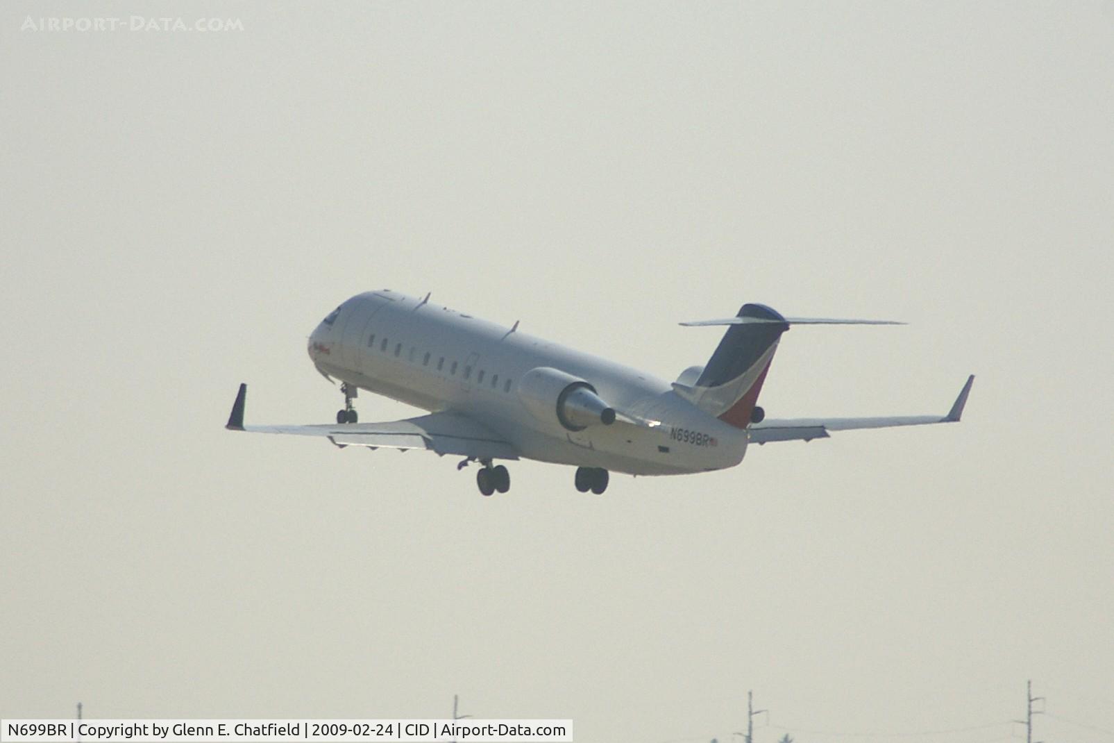 N699BR, 2003 Bombardier CRJ-200ER (CL-600-2B19) C/N 7801, Departing runway 13, over the departure end