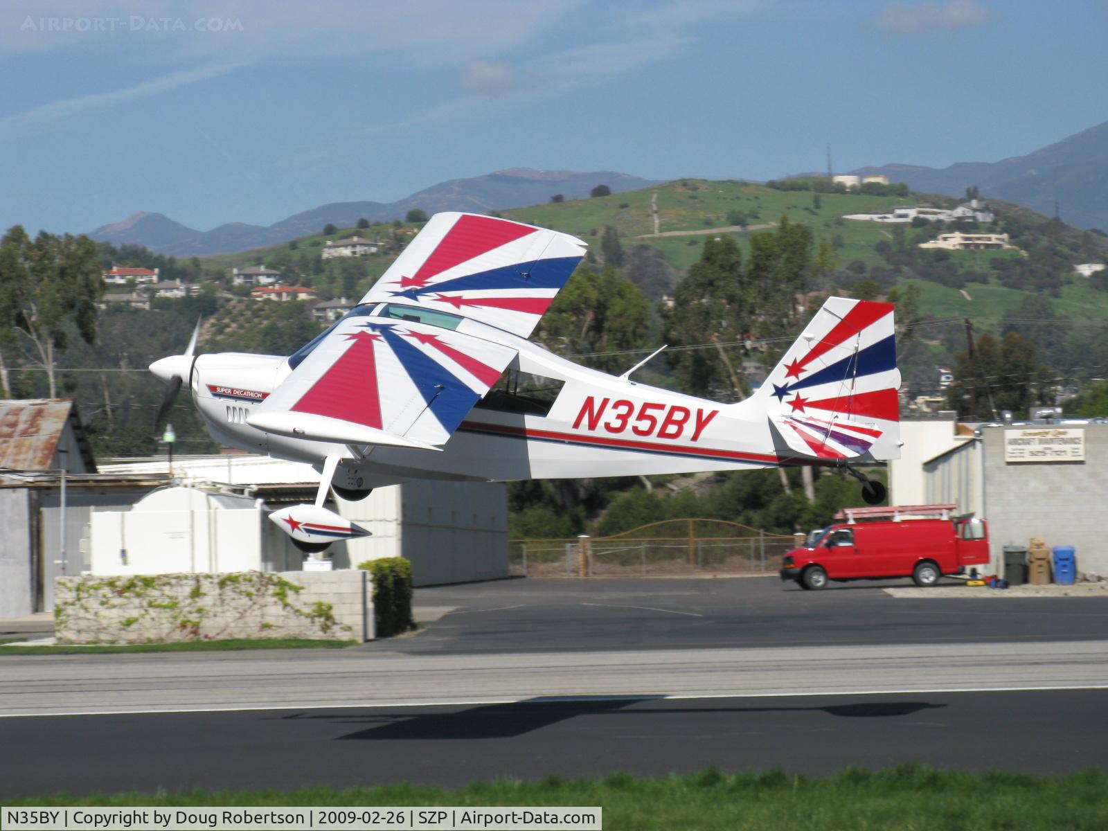N35BY, 2005 American Champion 8KCAB Super Decathlon C/N 998-2005, 2005 American Champion 8KCAB SUPER DECATHLON, Lycoming AEIO-360-H1B 180 Hp, CS prop, near symmetrical airfoil wing, Master Aerobatic CFI Rich Stowell photo presentation takeoff climb Rwy 22