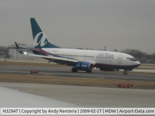 N329AT, 2007 Boeing 737-7BD C/N 36091, Just landed- thrust reversers still deployed