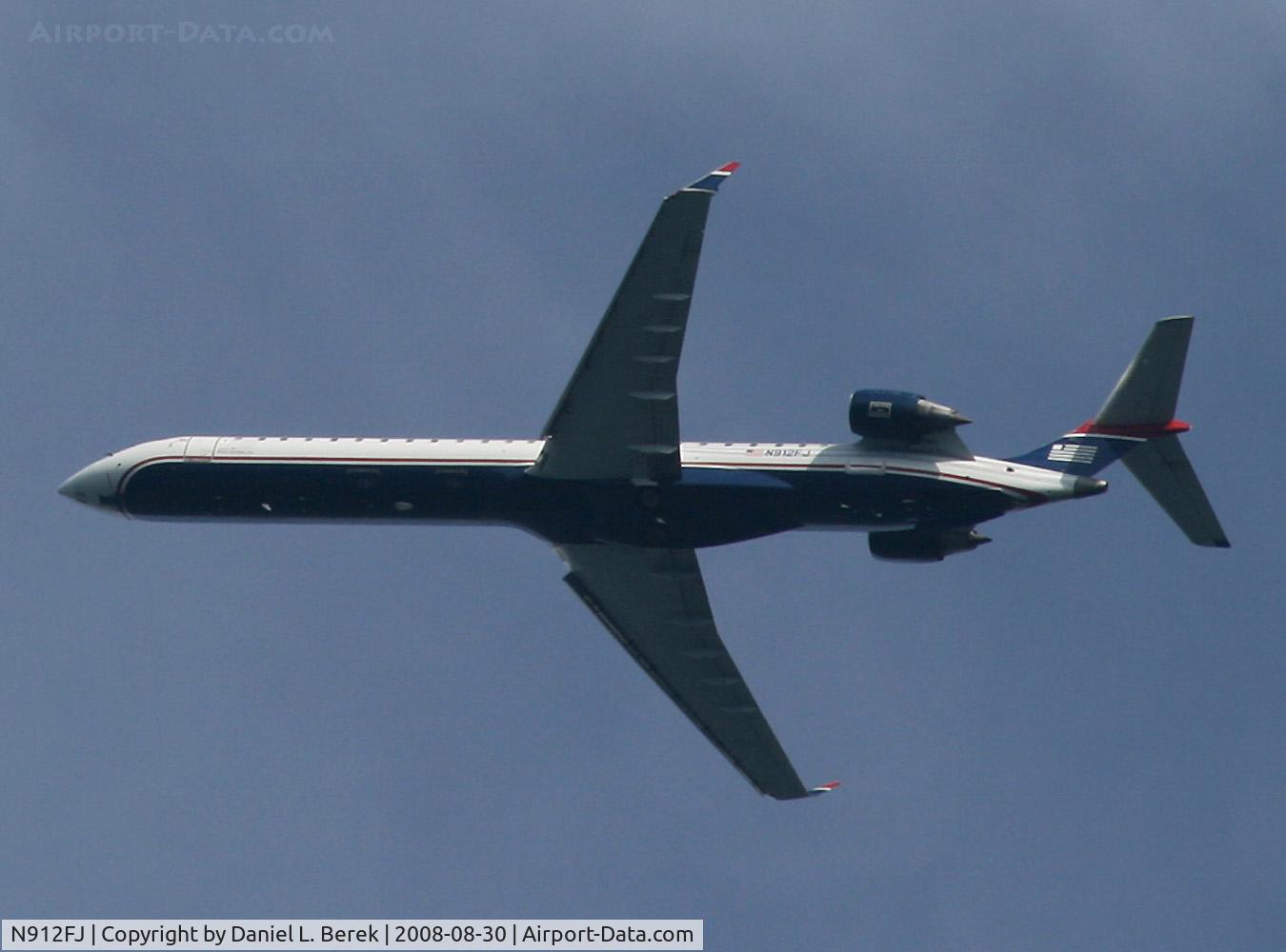N912FJ, 2004 Bombardier CRJ-900ER (CL-600-2D24) C/N 15012, This sleek regional jet was flying over Morristown, NJ.
