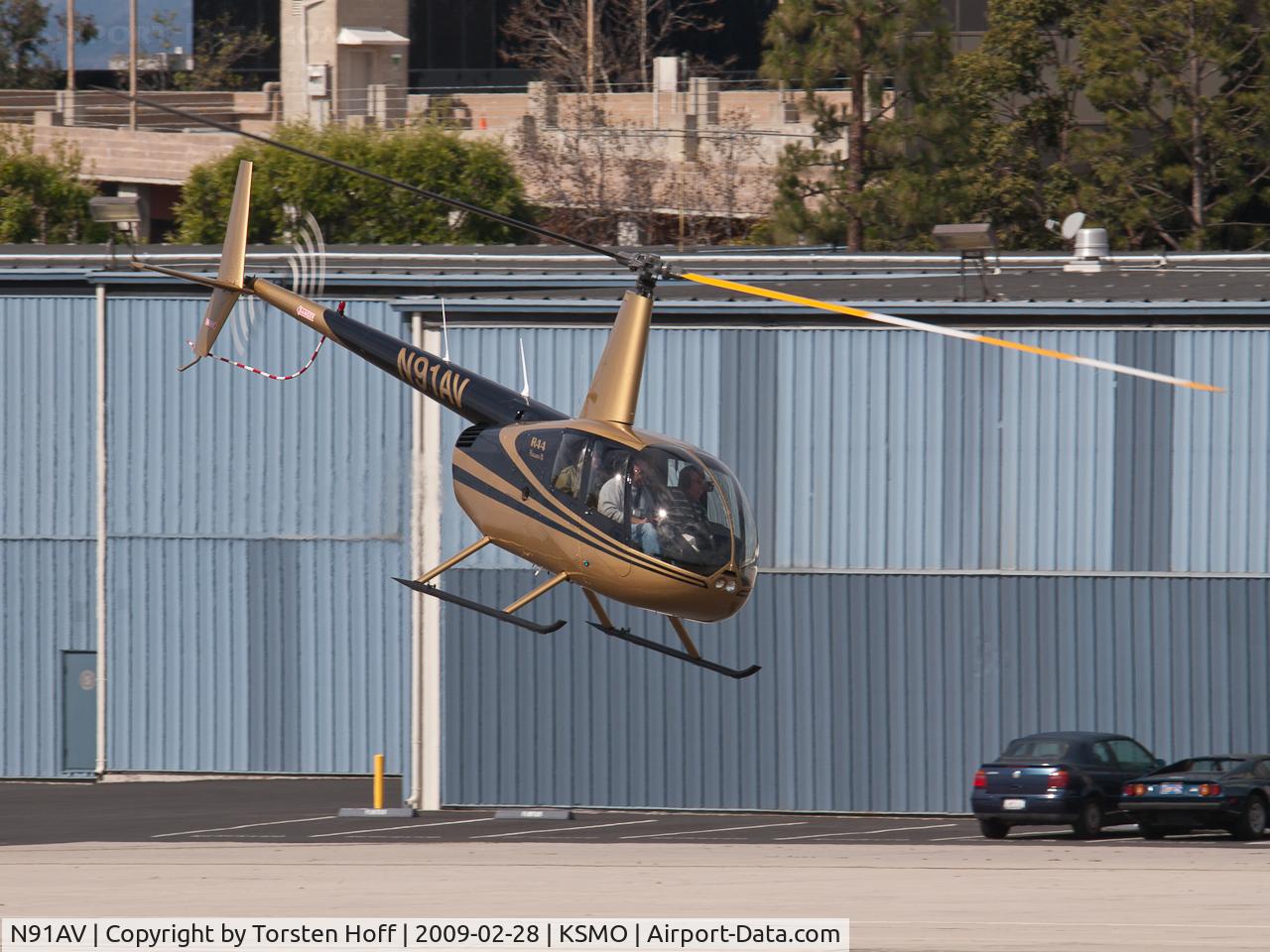 N91AV, 2006 Robinson R44 Raven II C/N 11392, N91AV over RWY 03