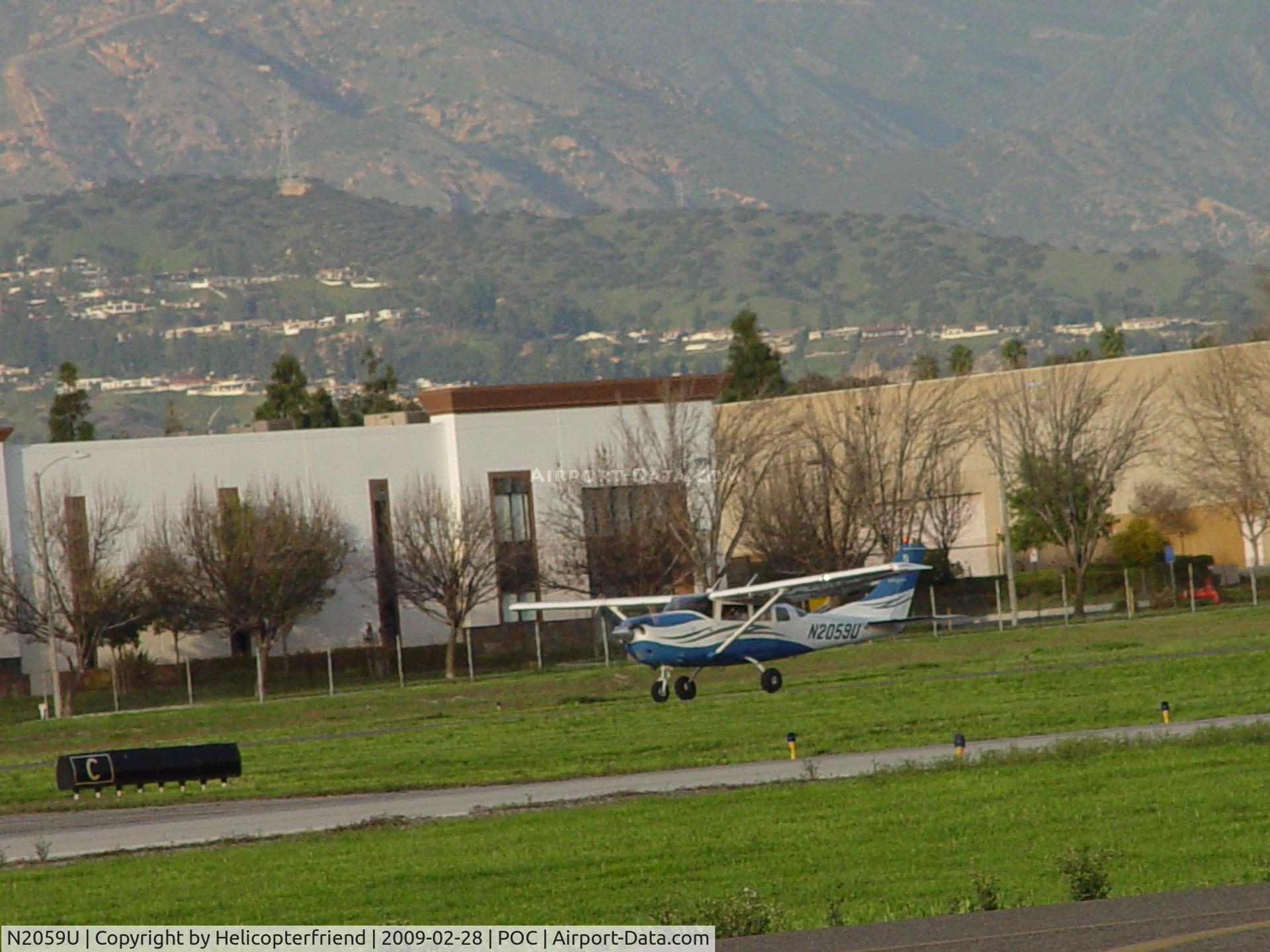 N2059U, 2006 Cessna T206H Turbo Stationair C/N T20608701, Rolling westbound on 26L at Brackett