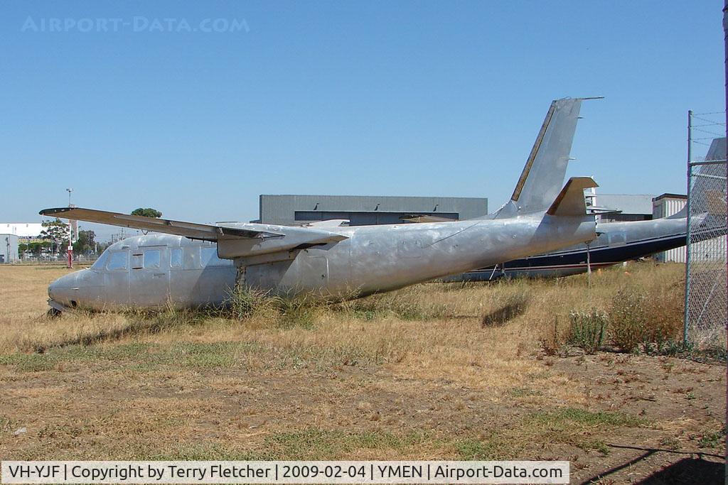 VH-YJF, 1966 Aero Commander 680FL Commander C/N 1642-122, Stripped Aero Commander at Essendon