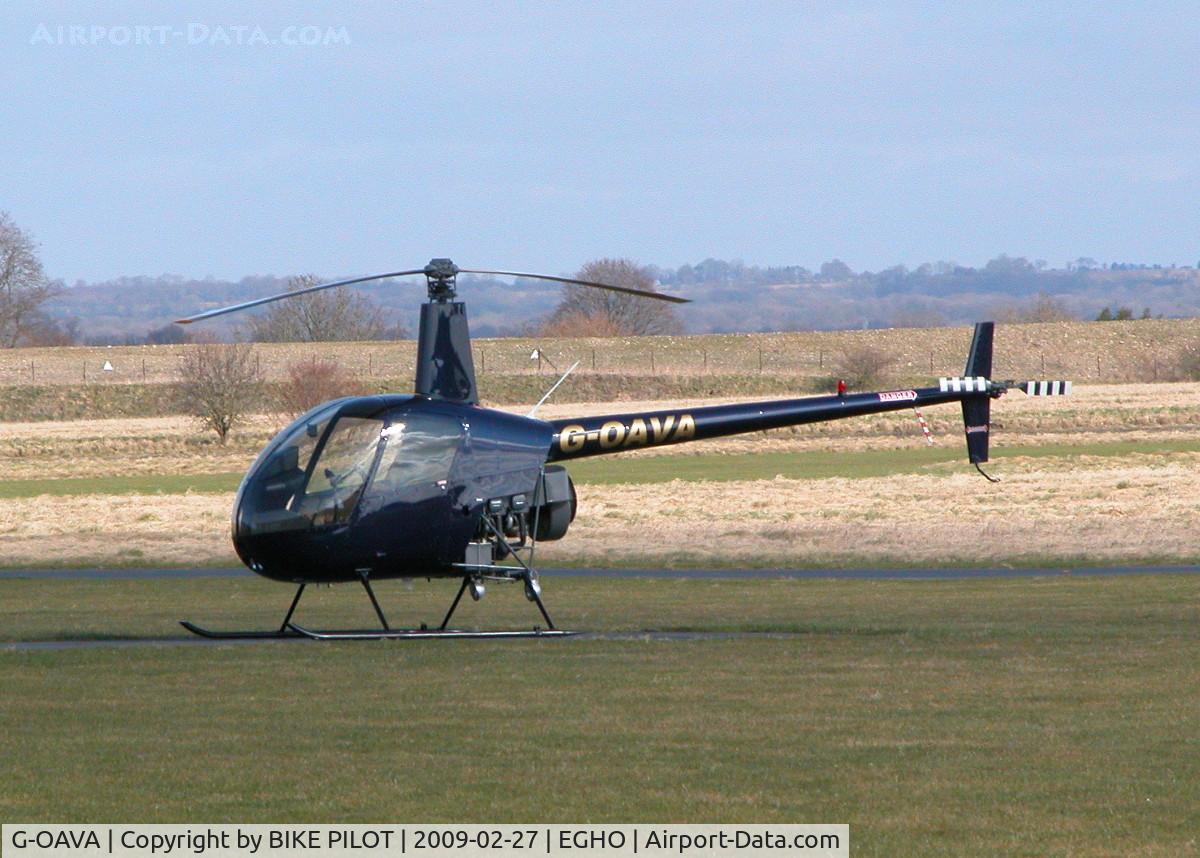 G-OAVA, 2002 Robinson R22 Beta C/N 3303, ONE OF THREE R22'S OUTSIDE FAST HELICOPTERS HANGER