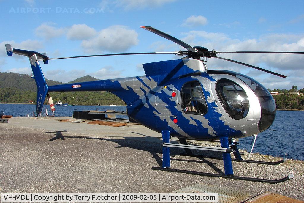VH-MDL, Hughes 369D C/N 490484D, Hughes 369D on the Strahan Helipad , West Tasmania