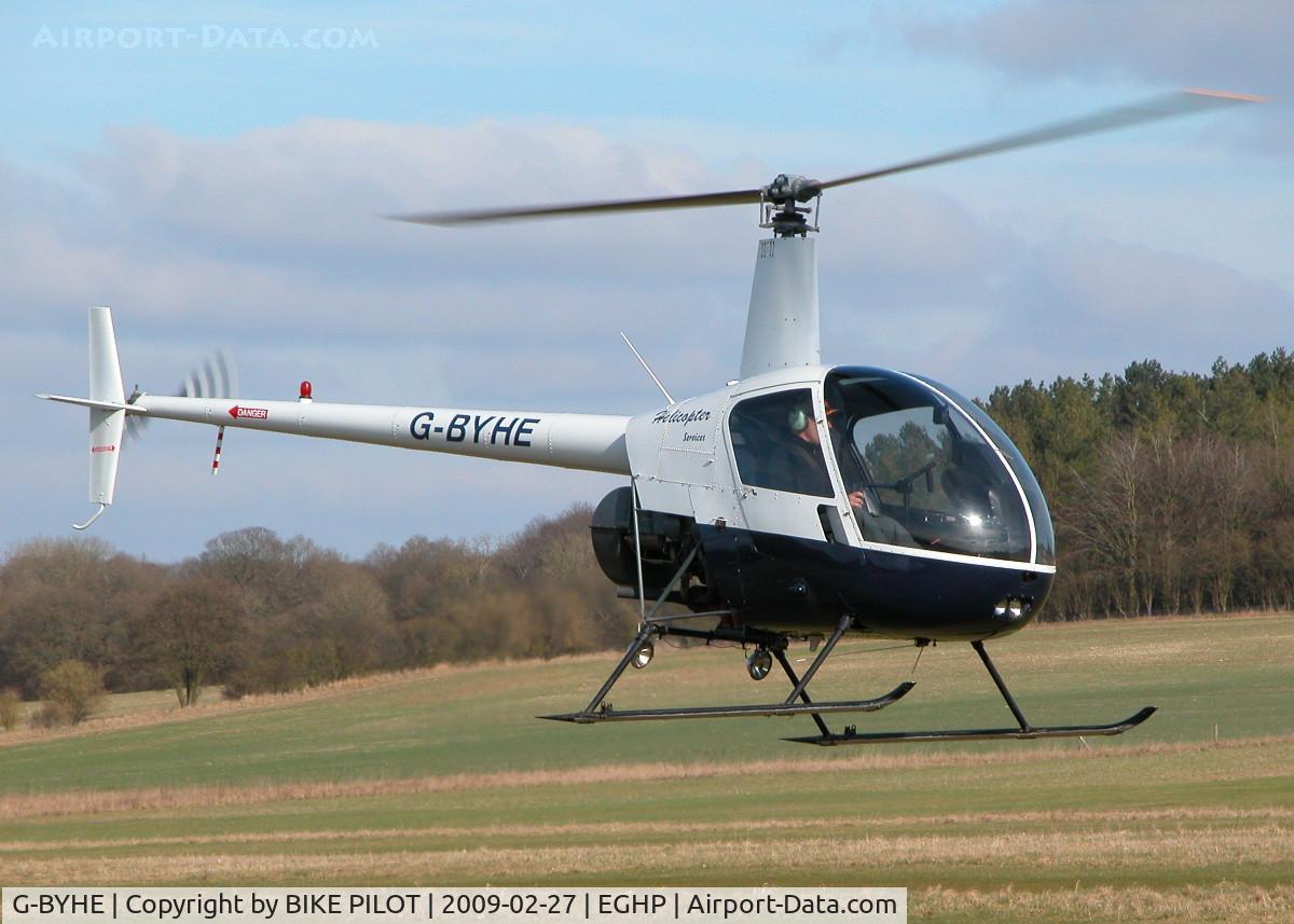 G-BYHE, 1991 Robinson R22 Beta C/N 2023, CLIMBING OUT FOR DEPARTURE