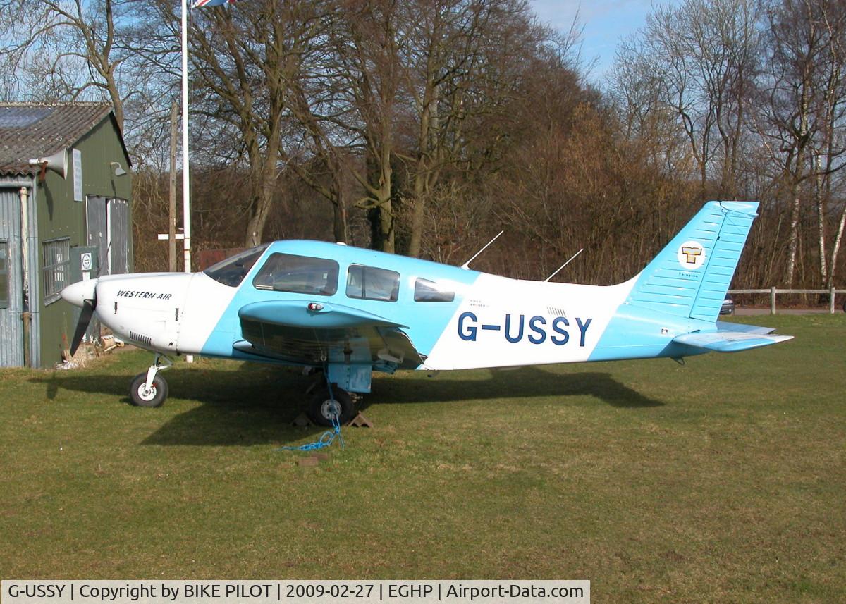 G-USSY, 1982 Piper PA-28-181 Cherokee Archer II C/N 28-8290011, PARKED UP OUTSIDE THE WILTSHIRE AVIATION HANGER