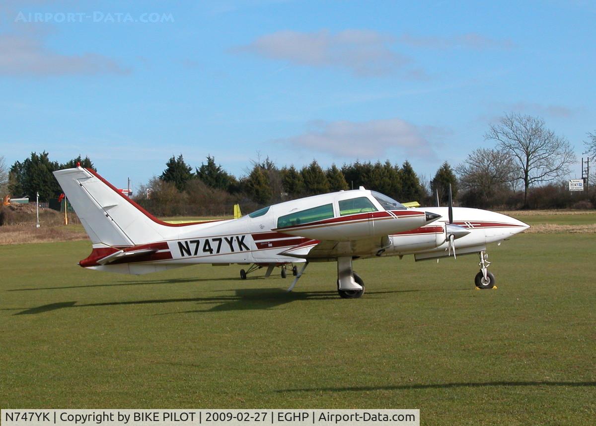 N747YK, 1975 Cessna 310R C/N 310R0138, NICE 310 SITTING IN THE AFTERNOON SUN