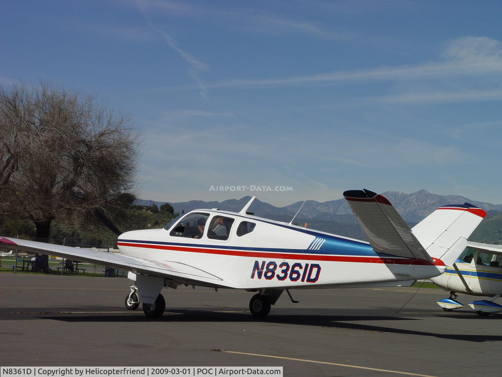 N8361D, 1958 Beech J35 Bonanza C/N D-5471, Getting ready to start up and taxi out of transient parking at Brackett