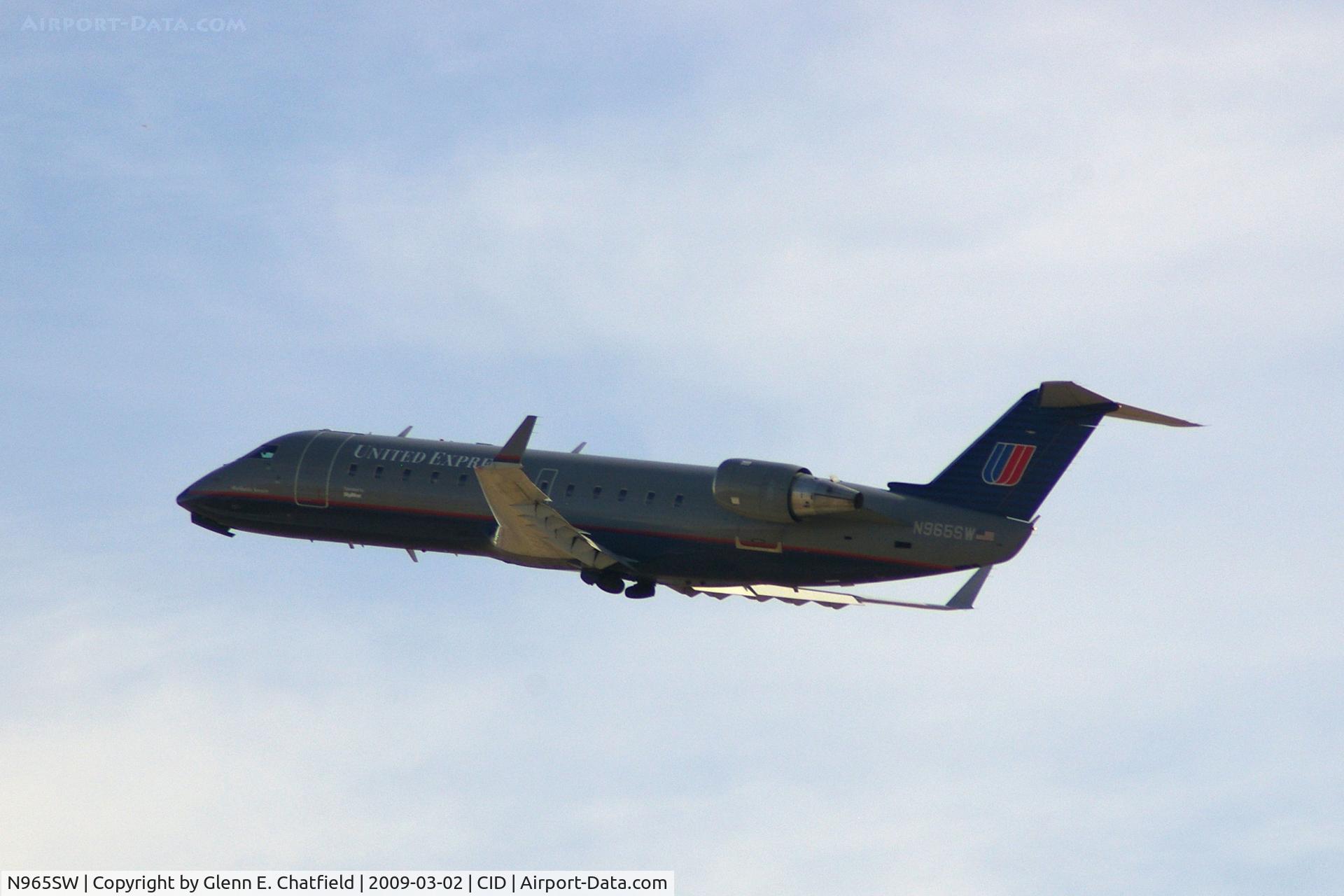 N965SW, 2003 Bombardier CRJ-200ER (CL-600-2B19) C/N 7871, Climbing out after taking off Runway 9, heading for Denver
