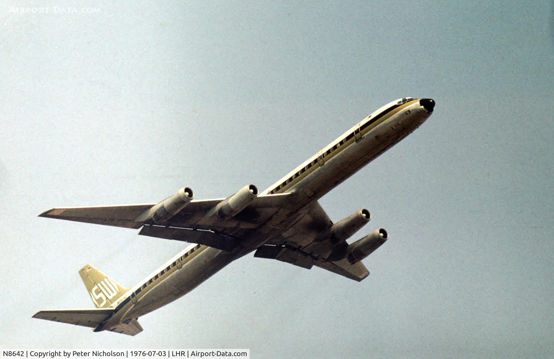 N8642, 1969 Douglas DC-8-73F C/N 46109, Seaboard World Airlines cargo flight departing London Heathrow in the Summer of 1976.