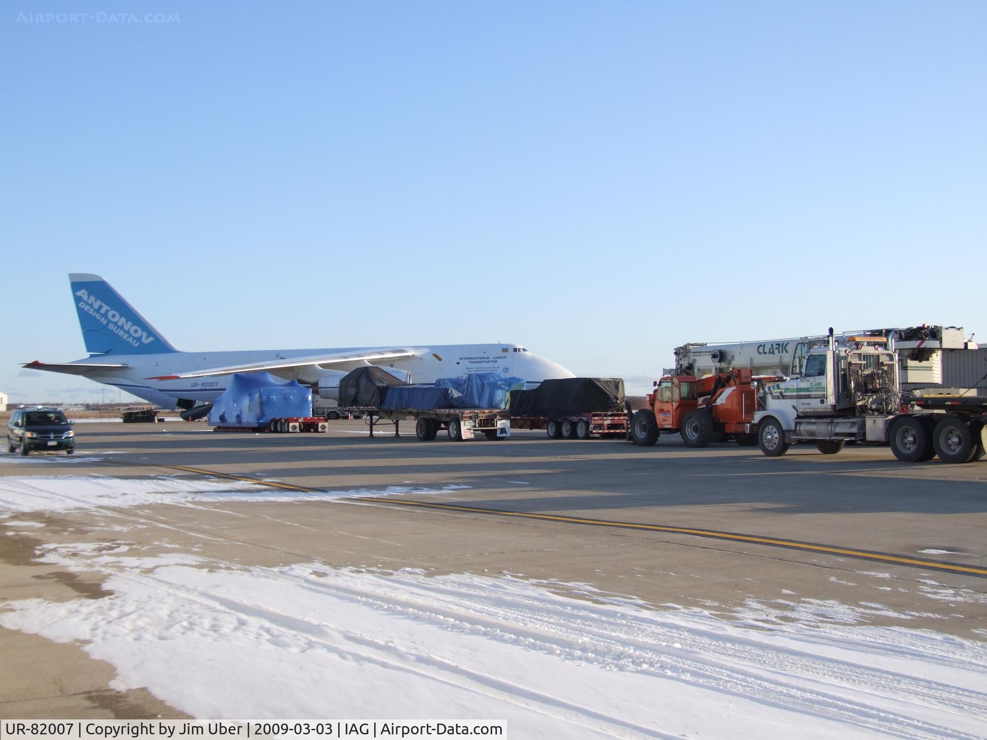 UR-82007, 1988 Antonov An-124-100 Ruslan C/N 19530501005, Part of the cargo to be loaded; Several more trucks pulled in as I was leaving
