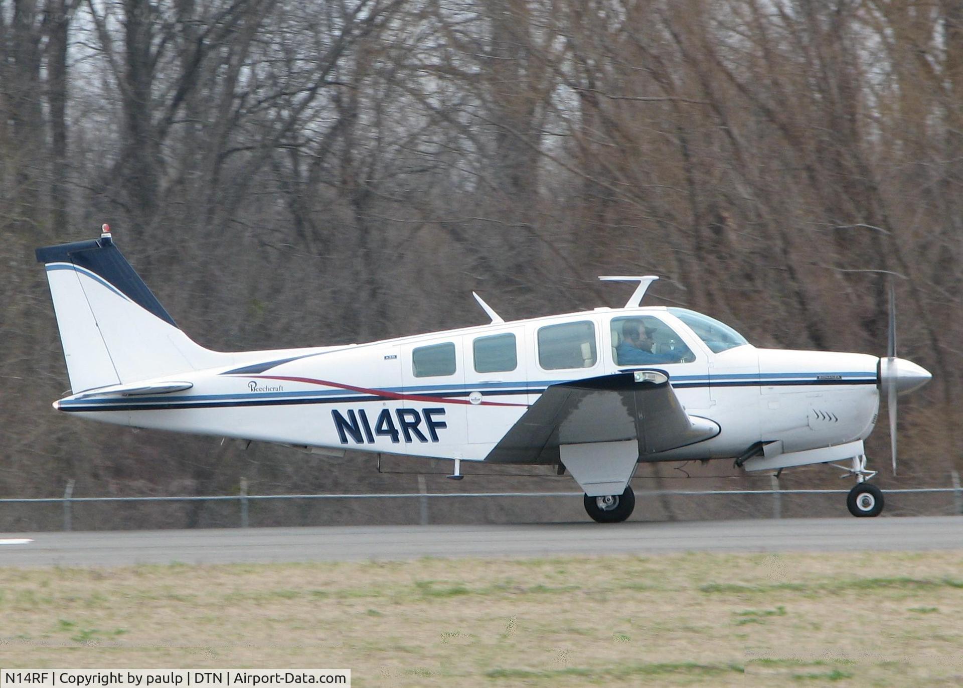 N14RF, 1973 Beech A36 Bonanza 36 C/N E-486, Taking off from the Shreveport Downtown airport.