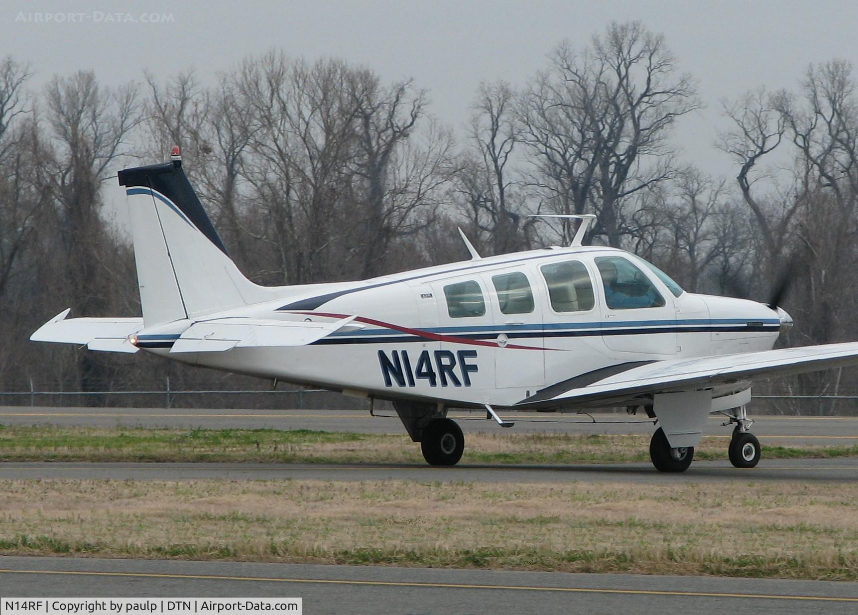 N14RF, 1973 Beech A36 Bonanza 36 C/N E-486, Turning onto runway 14 at the Shreveport Downtown airport.