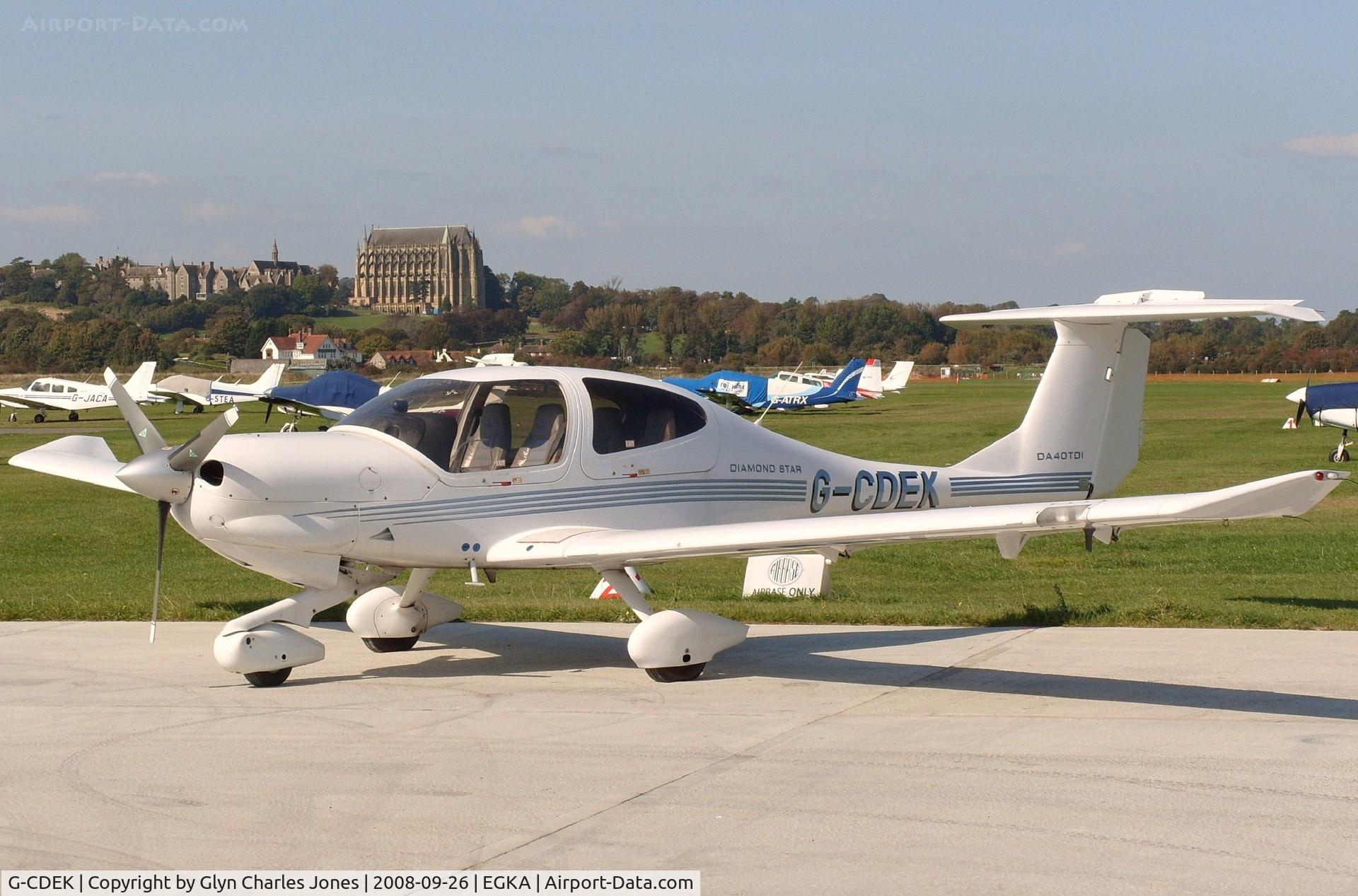 G-CDEK, 2004 Diamond DA-40TDI Diamond Star C/N D4.143, Lancing College in the background. Owned by ADR Aviation.