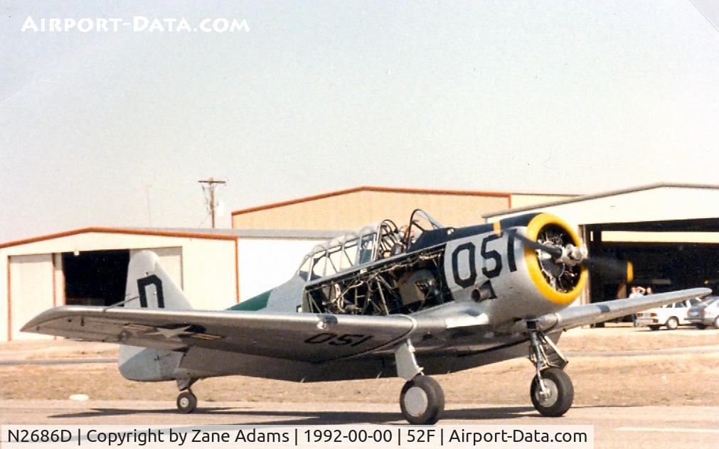 N2686D, 1944 North American SNJ-5 Texan Texan C/N 121-41987, Landing at North West Regional (Aero Valley) after loosing a side panel during flight.