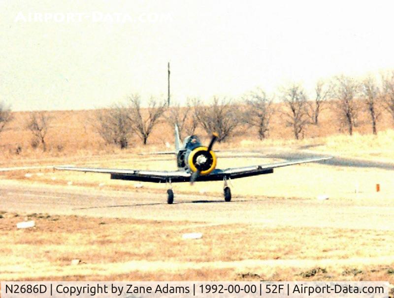 N2686D, 1944 North American SNJ-5 Texan Texan C/N 121-41987, Landing at North West Regional (Aero Valley) after loosing a side panel during flight.