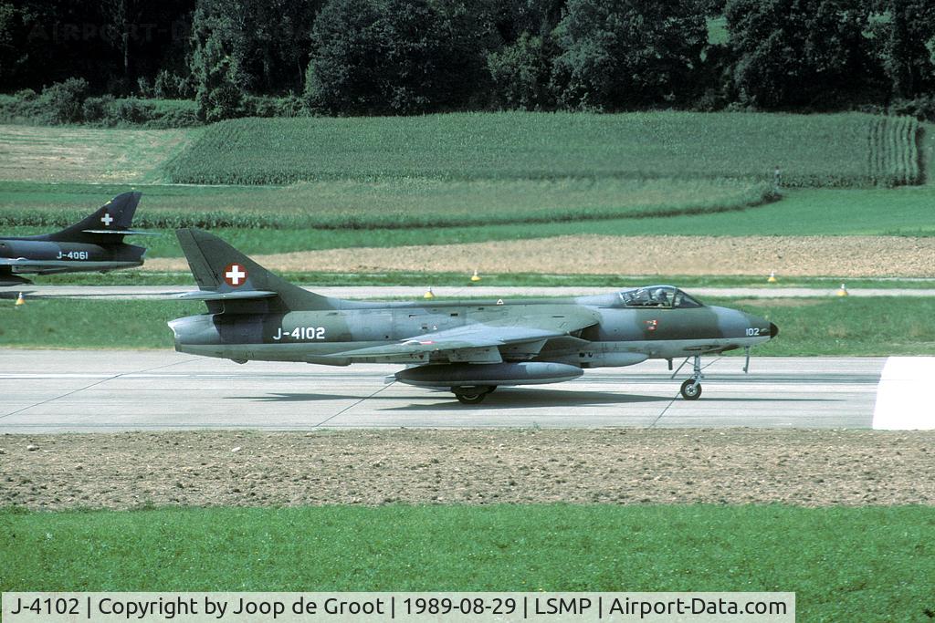 J-4102, Hawker Hunter F.58A C/N S4U/3314, Take off run from Payerne. Seen from top of a storage hill at the south side of the airfield.