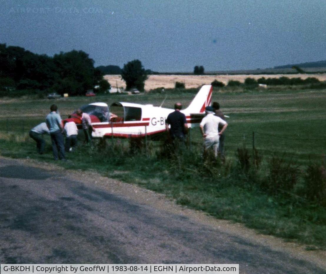 G-BKDH, 1982 Robin DR-400-120 Petit Prince C/N 1582, Robin DR400/120 G-BKDH visited Sandown on 14.8.83 and somehow managed to get tangled up with a wire fence in the process. No harm was done fortunately