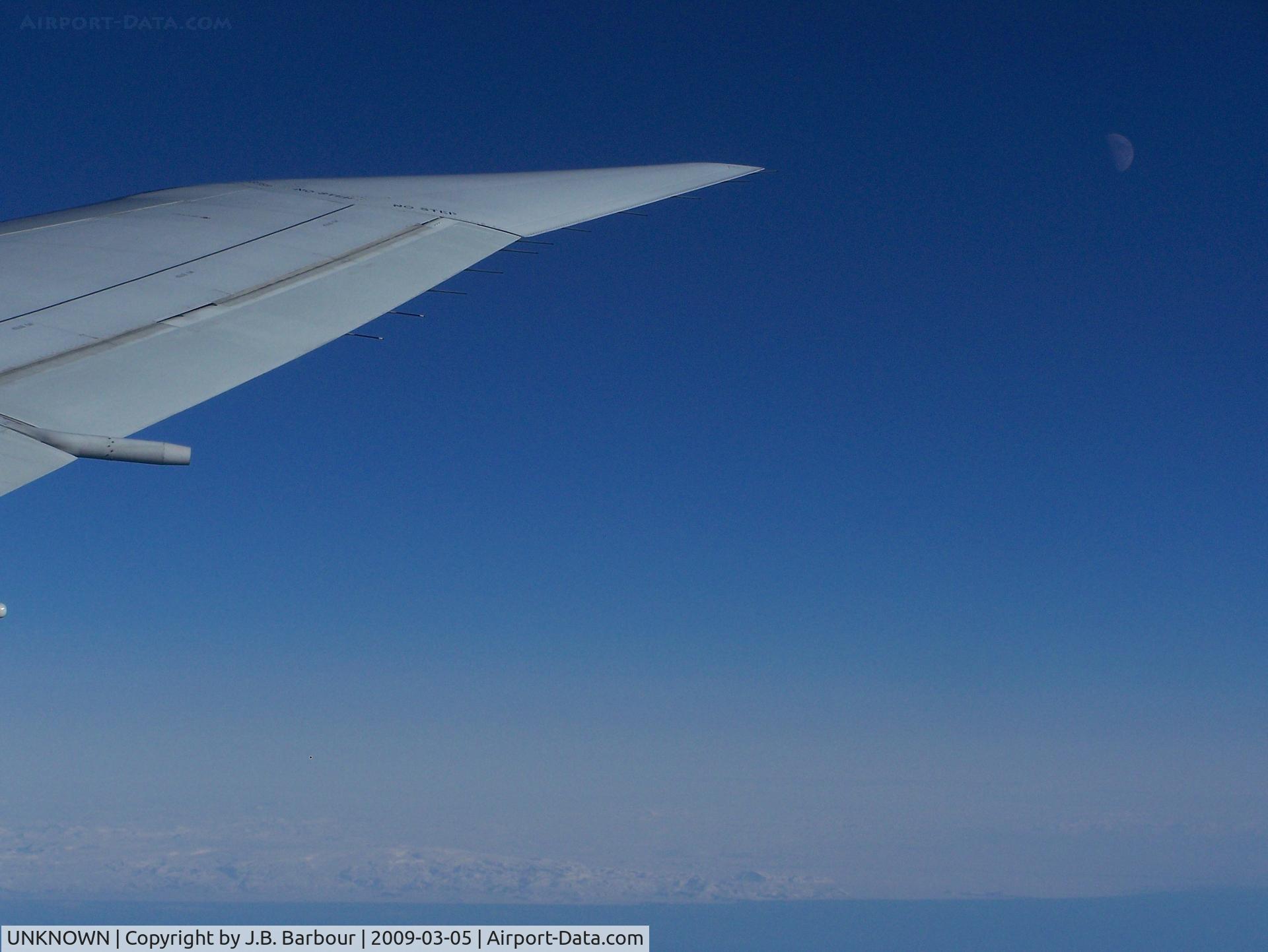 UNKNOWN, Airliners Various C/N Unknown, Onboard a B767 and flying near the Iceland border.  This picture doesn't seem to do it justice but just below there were a lot of iceberg's.  The outside temp. was about -43 degrees at 33000 ft.