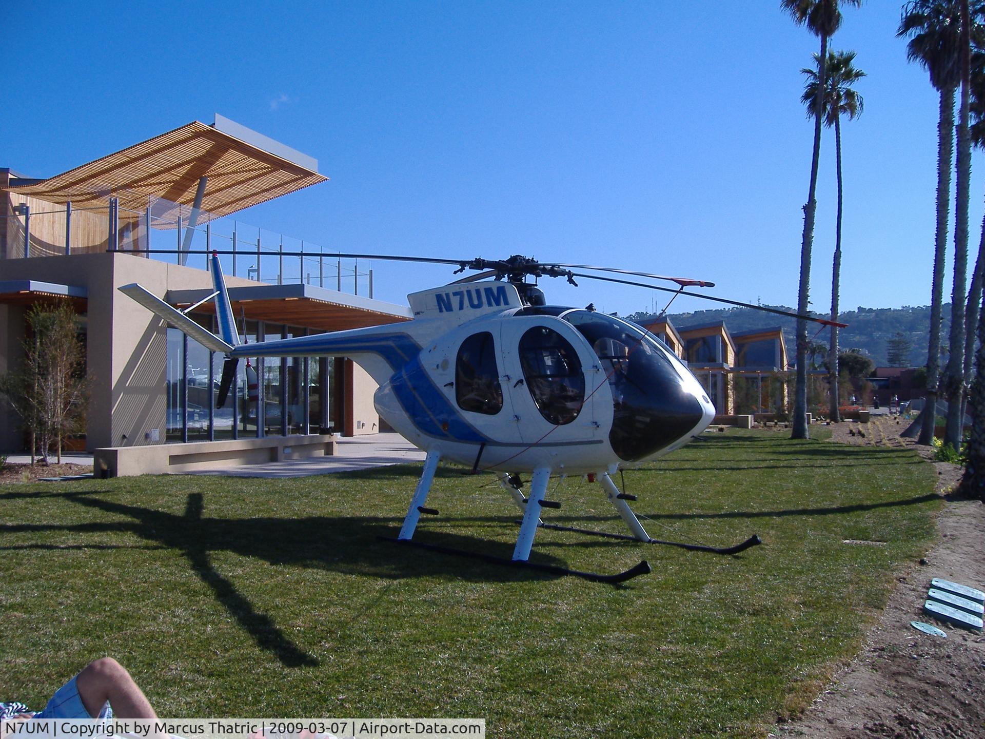 N7UM, 1975 Hughes 369HS C/N 850767S, Parked at Scripps Institution of Oceanography lawn