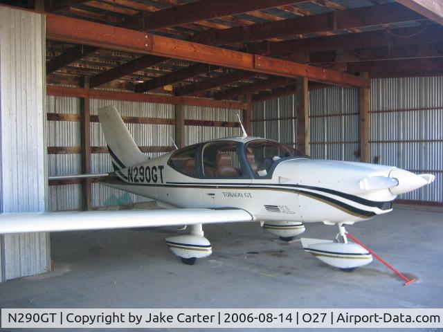 N290GT, 2002 Socata TB-200 C/N 2090, Parked in a hangar at at Oakdale Airport before sale.