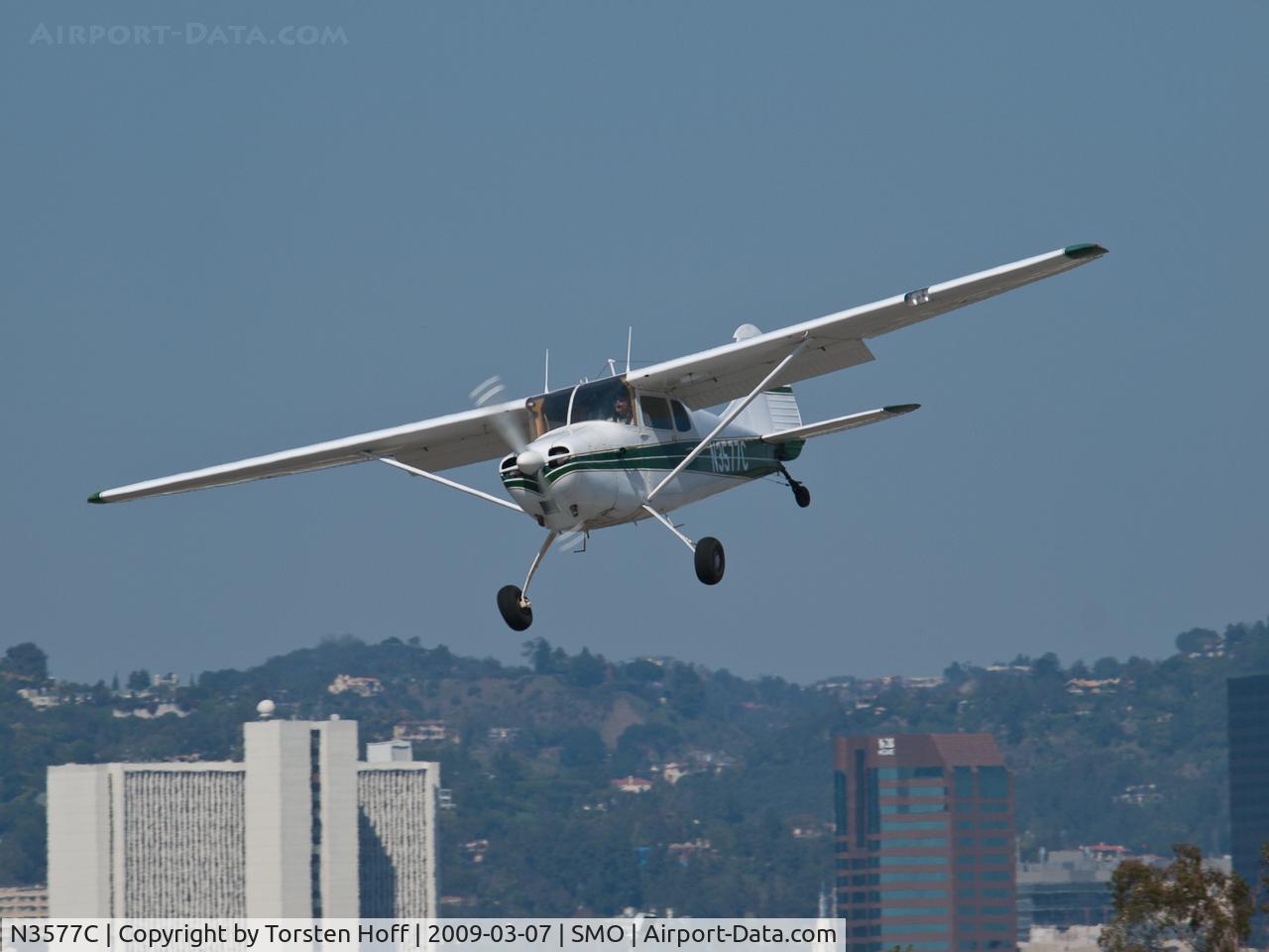 N3577C, 1954 Cessna 170B C/N 26621, N3577C in a slip to lose altitude while arriving on RWY 21