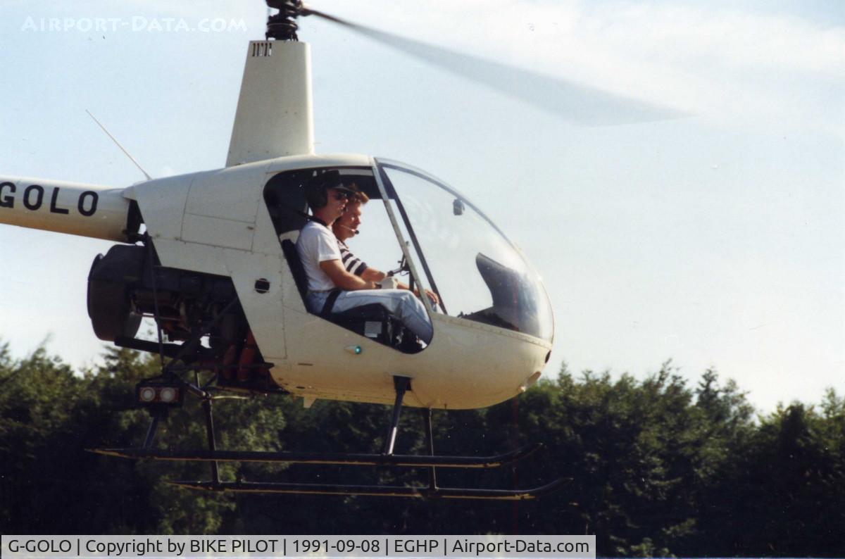 G-GOLO, 1989 Robinson R22 Beta C/N 1124, DEPARTING A POPHAM FLY-IN