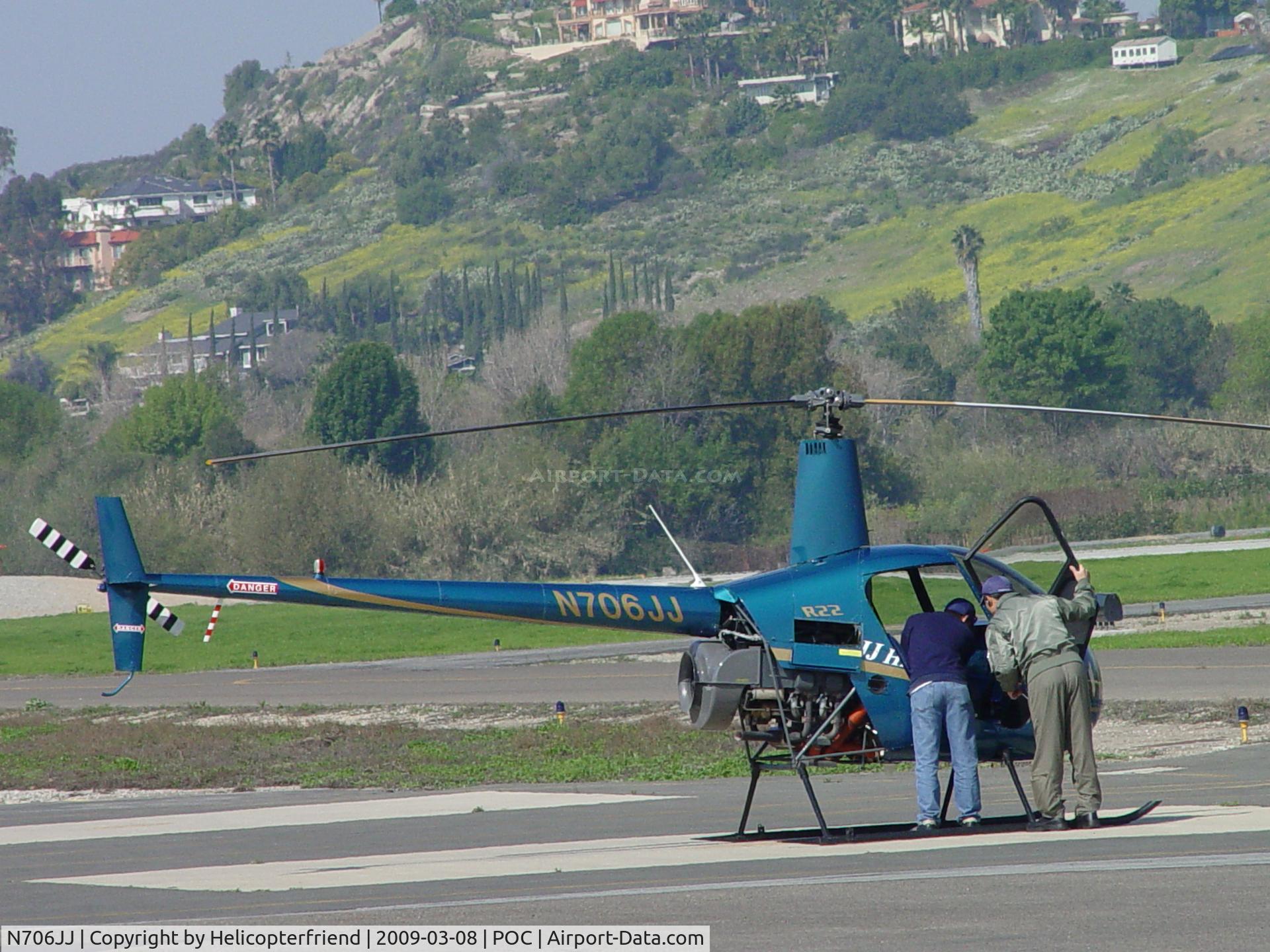 N706JJ, 2008 Robinson R22 C/N 4306, Checking the ship over after landing at Helipad 2 at Brackett