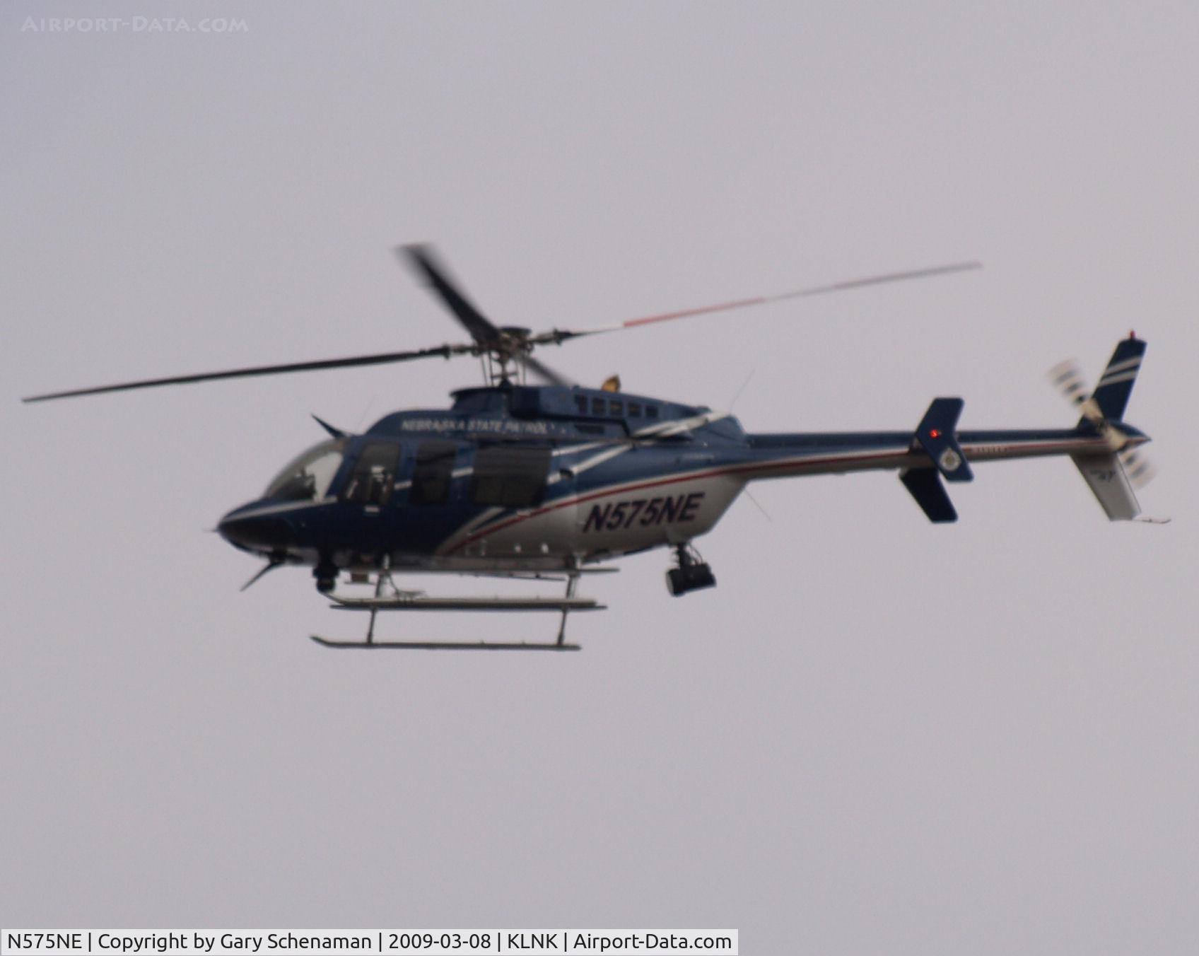 N575NE, 2005 Bell 407 C/N 53670, Nebraska State Patrol, Searching for a wanted person.  My neighborhood was being very heavly patrolled