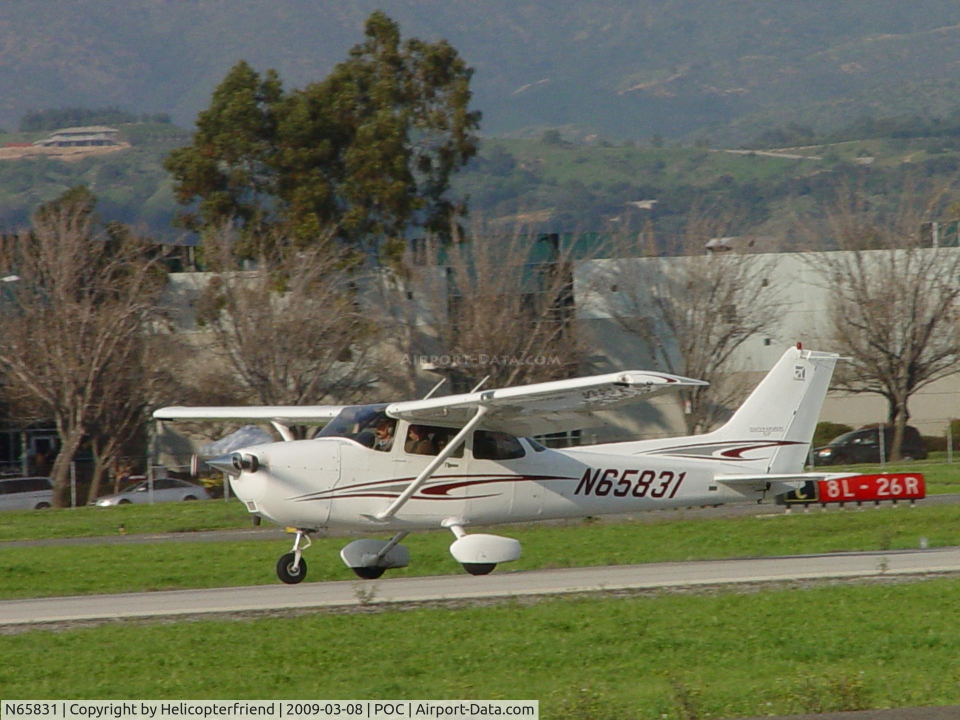 N65831, 2005 Cessna 172S C/N 172S9796, Touched down and rolling out westbound 26L