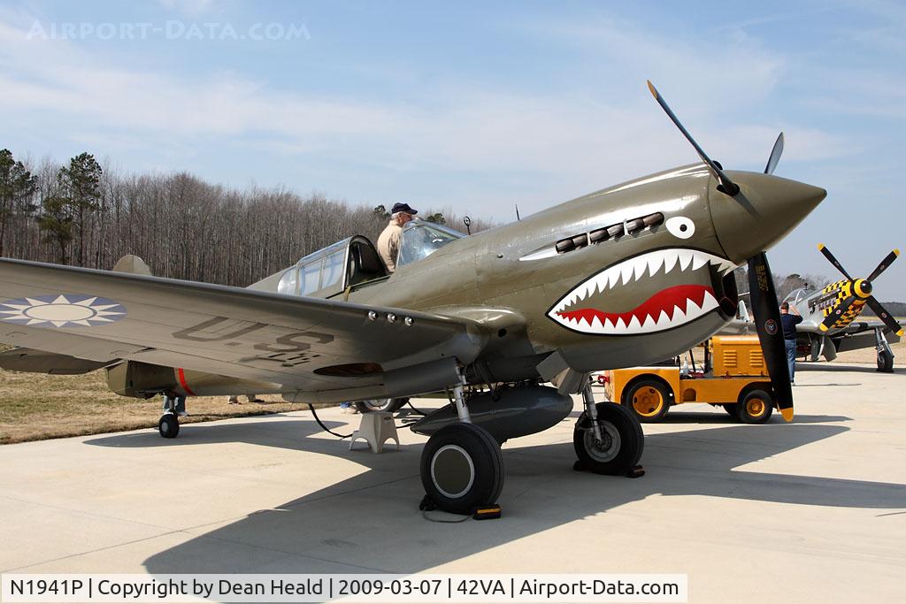 N1941P, 1941 Curtiss P-40E C/N 1025, The pilot of this 1941 Curtiss Wright P-40E Kittyhawk awaits his turn to fly a demonstration with 