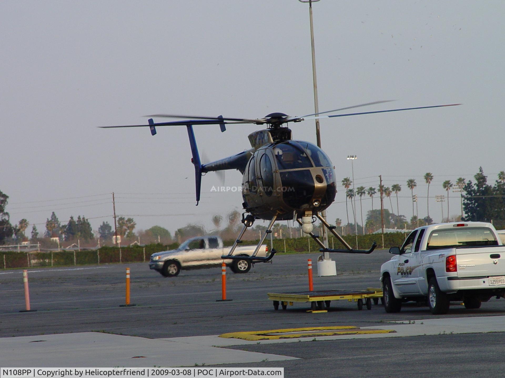 N108PP, 2008 MD Helicopters 369E C/N 0578E, Lifting off of transporter, ready to take flight