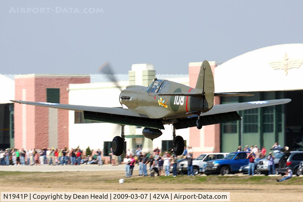 N1941P, 1941 Curtiss P-40E C/N 1025, 1941 Curtiss Wright P-40E Kittyhawk N1941P landing on RWY 29 after a great flight demostration, with a large crowd to witness this event.
