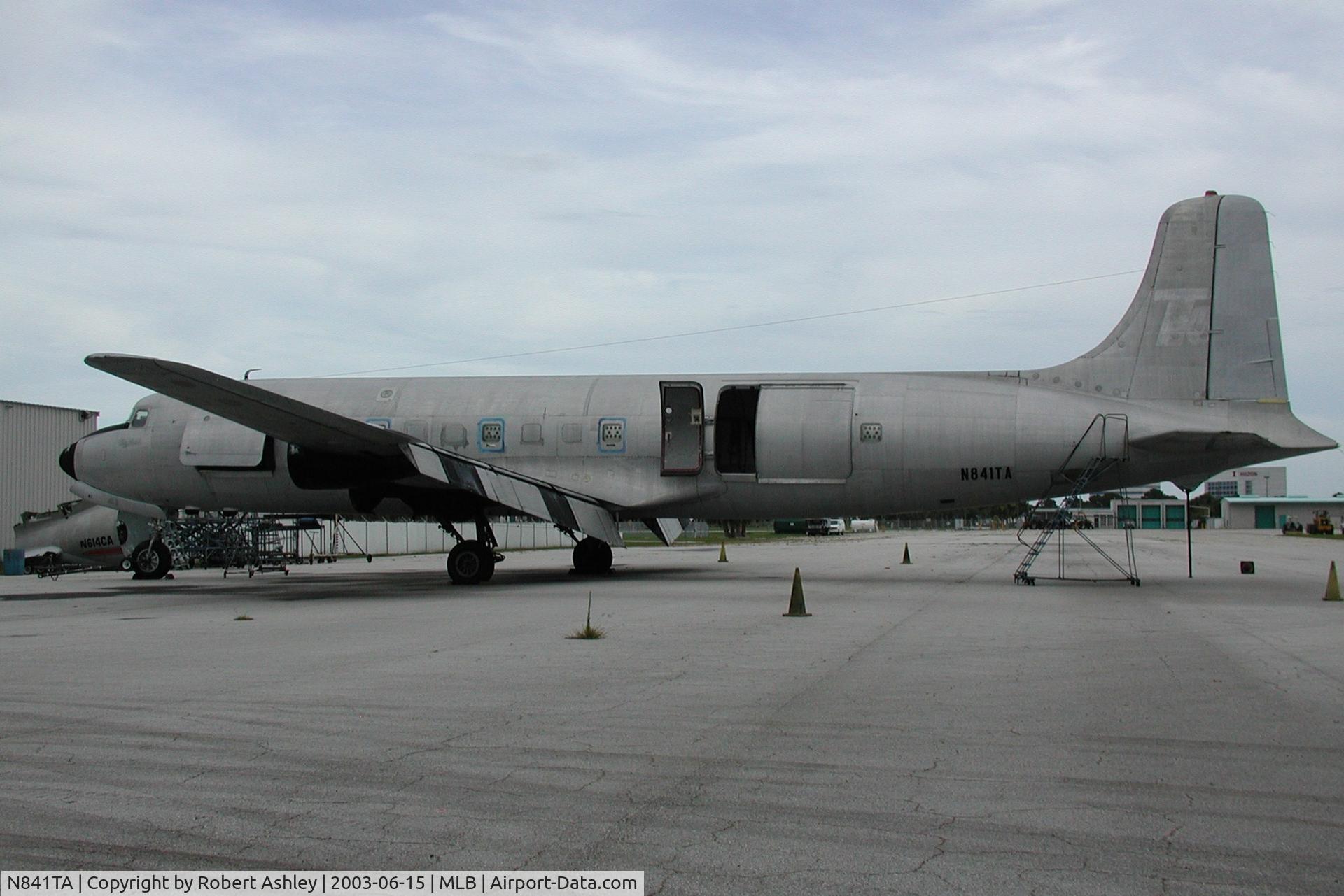 N841TA, 1956 Douglas DC-6B C/N 44891, Aircraft being disassembled in place
