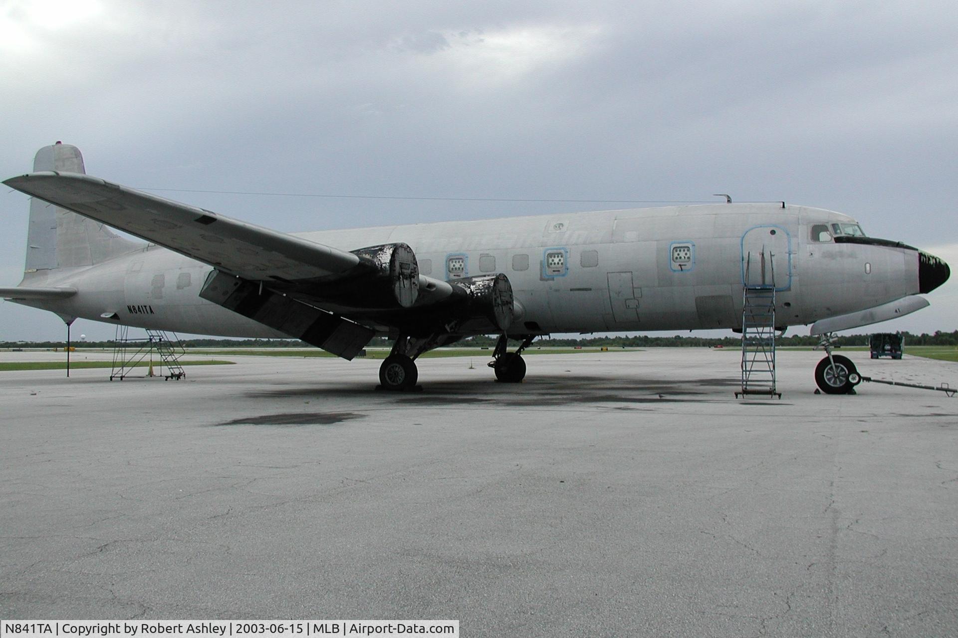 N841TA, 1956 Douglas DC-6B C/N 44891, Aircraft being disassembled in place