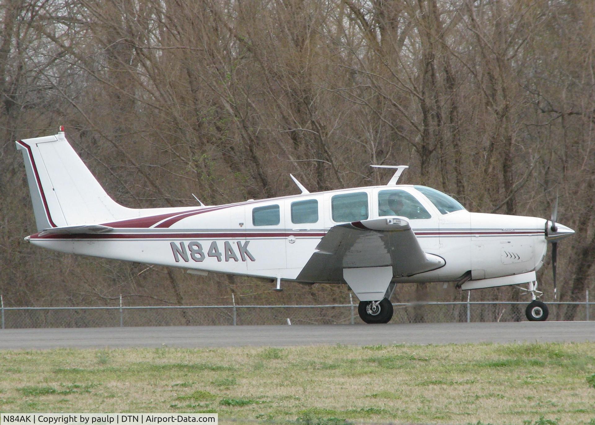 N84AK, 1977 Beech A36 Bonanza 36 C/N E-1167, Rolling down runway 14 at the Shreveport Downtown airport.