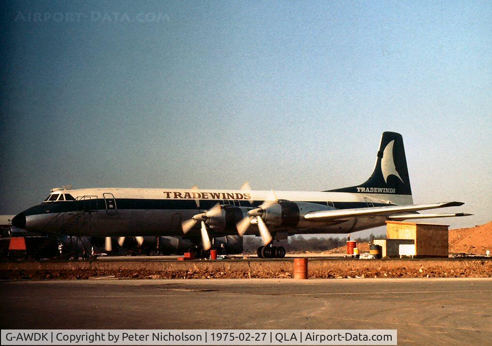 G-AWDK, 1961 Canadair CL-44D4-1 C/N 23, Tradewinds CL-44 undergoing maintenance at Lasham in 1975.