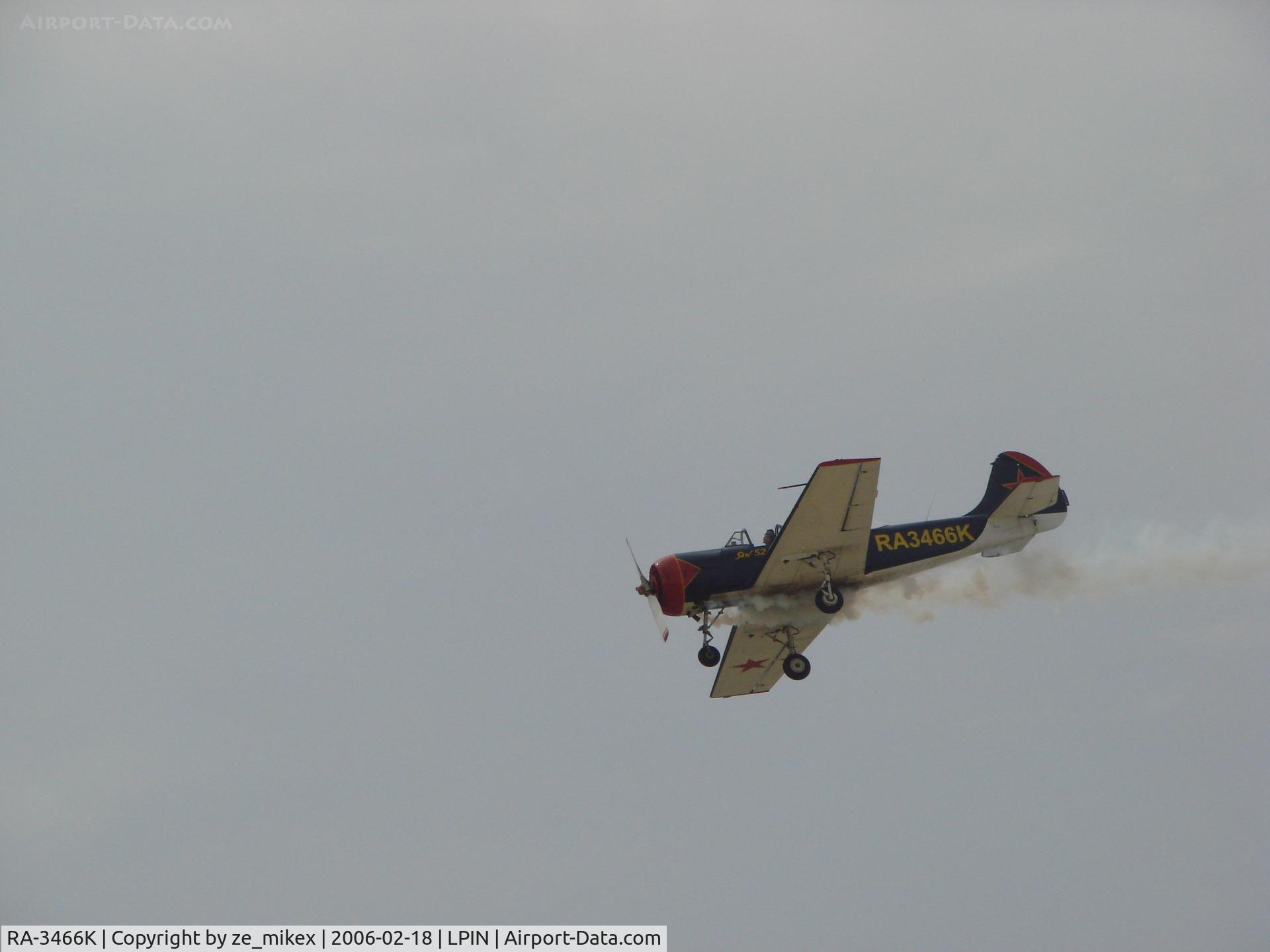 RA-3466K, 1982 Bacau Yak-52 C/N 822708, smoke wings yak 52 doing a aerobatic show at espinho