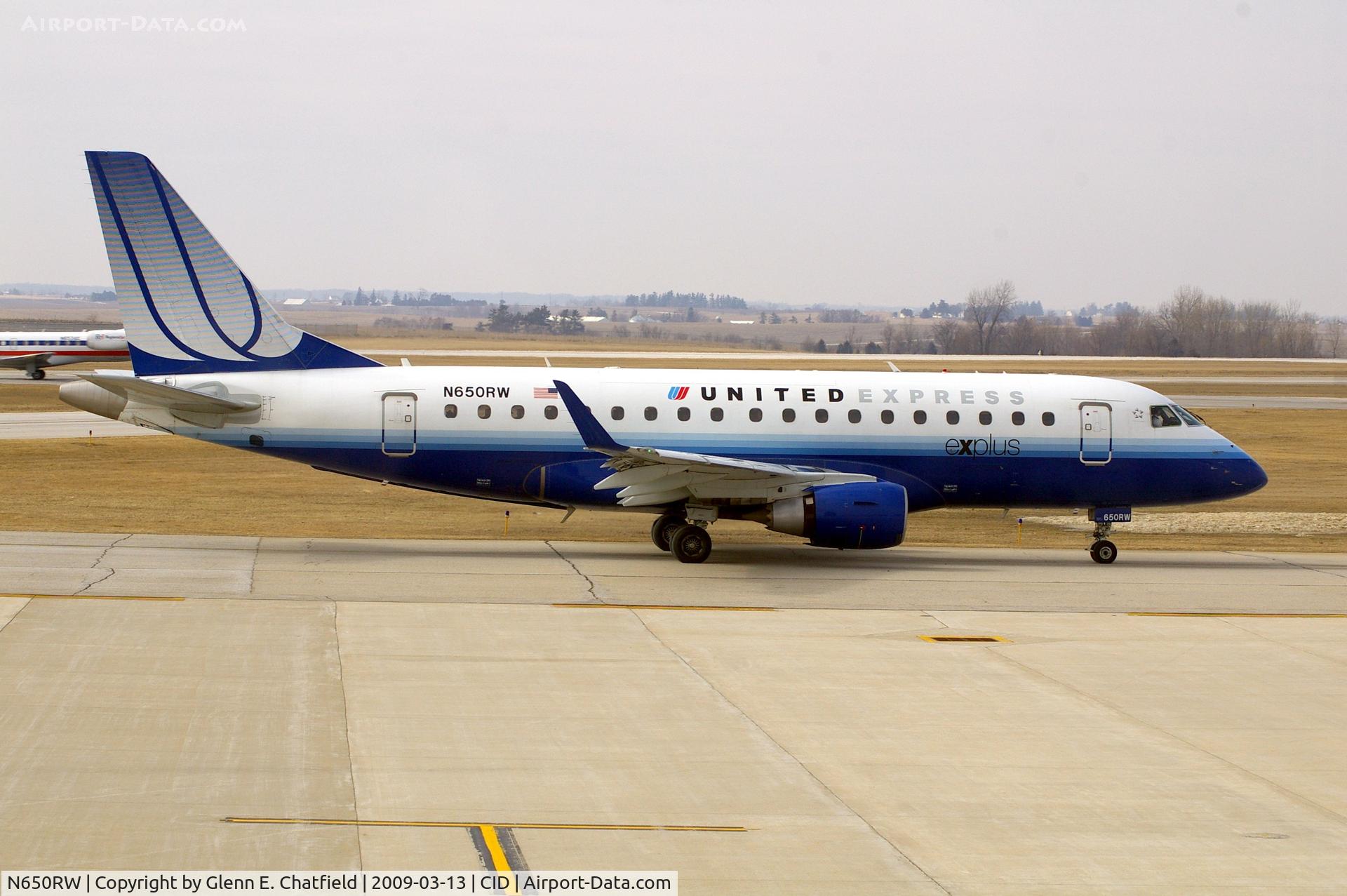N650RW, 2005 Embraer 170SE (ERJ-170-100SE) C/N 17000071, Taxiing by my window on the way to runway 13