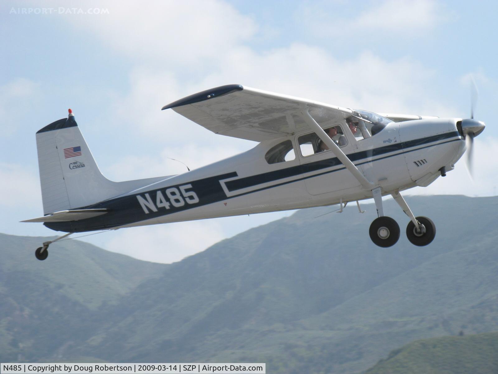 N485, 1959 Cessna 180B C/N 50595, 1959 Cessna 180B, Continental O-470 230 Hp, in production commencing 1953-this versatile workhorse would not be called the SKYWAGON until the 1969 model year, popular on wheels, skis, floats, takeoff climb Rwy 22