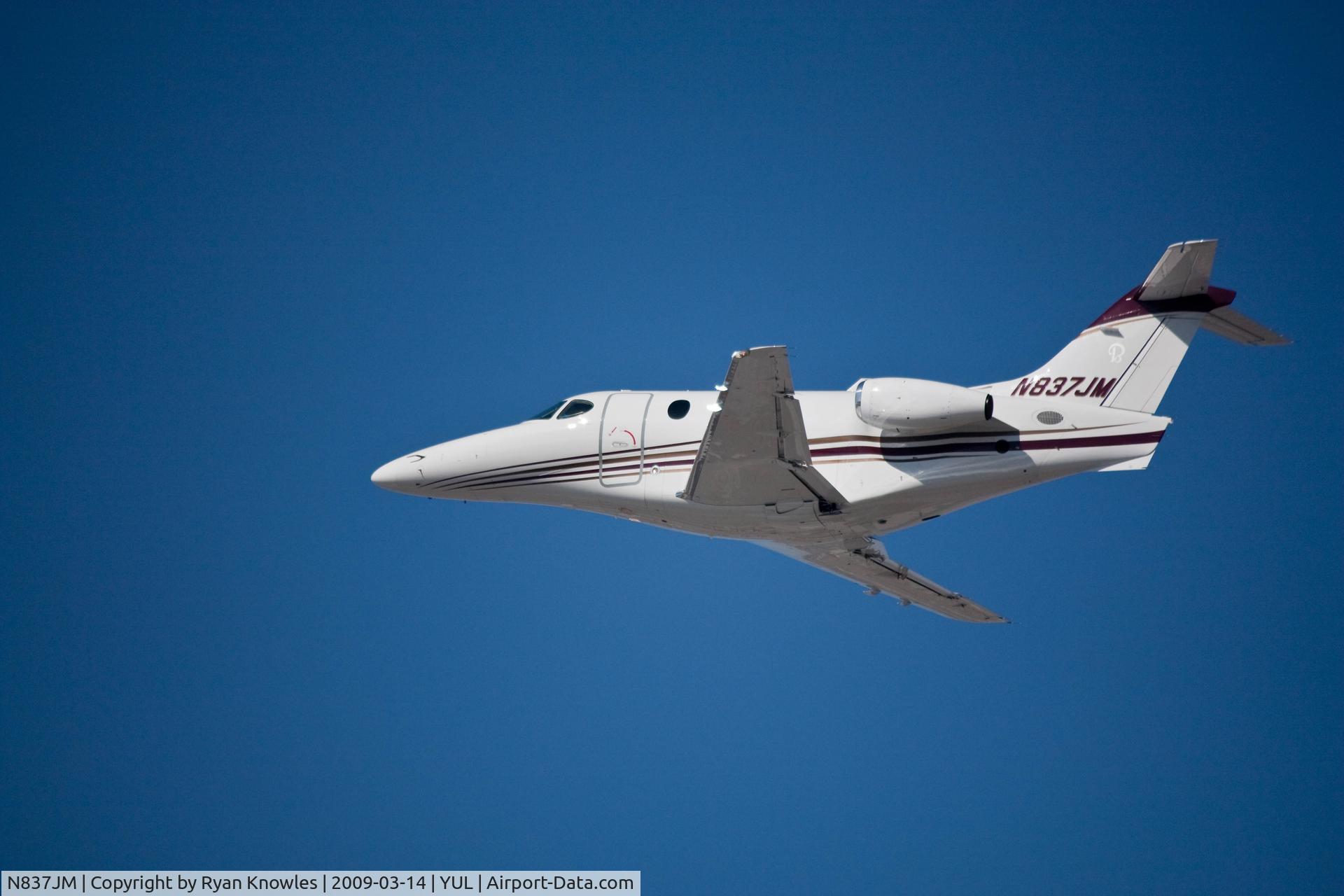 N837JM, Raytheon Aircraft Company 390 C/N RB-169, Taking off at Trudeau Aiport, Montreal, QC