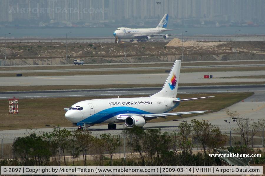 B-2897, 1991 Boeing 737-3Y0 C/N 24902, Donghai Airlines taxying to the end of runway 07R
