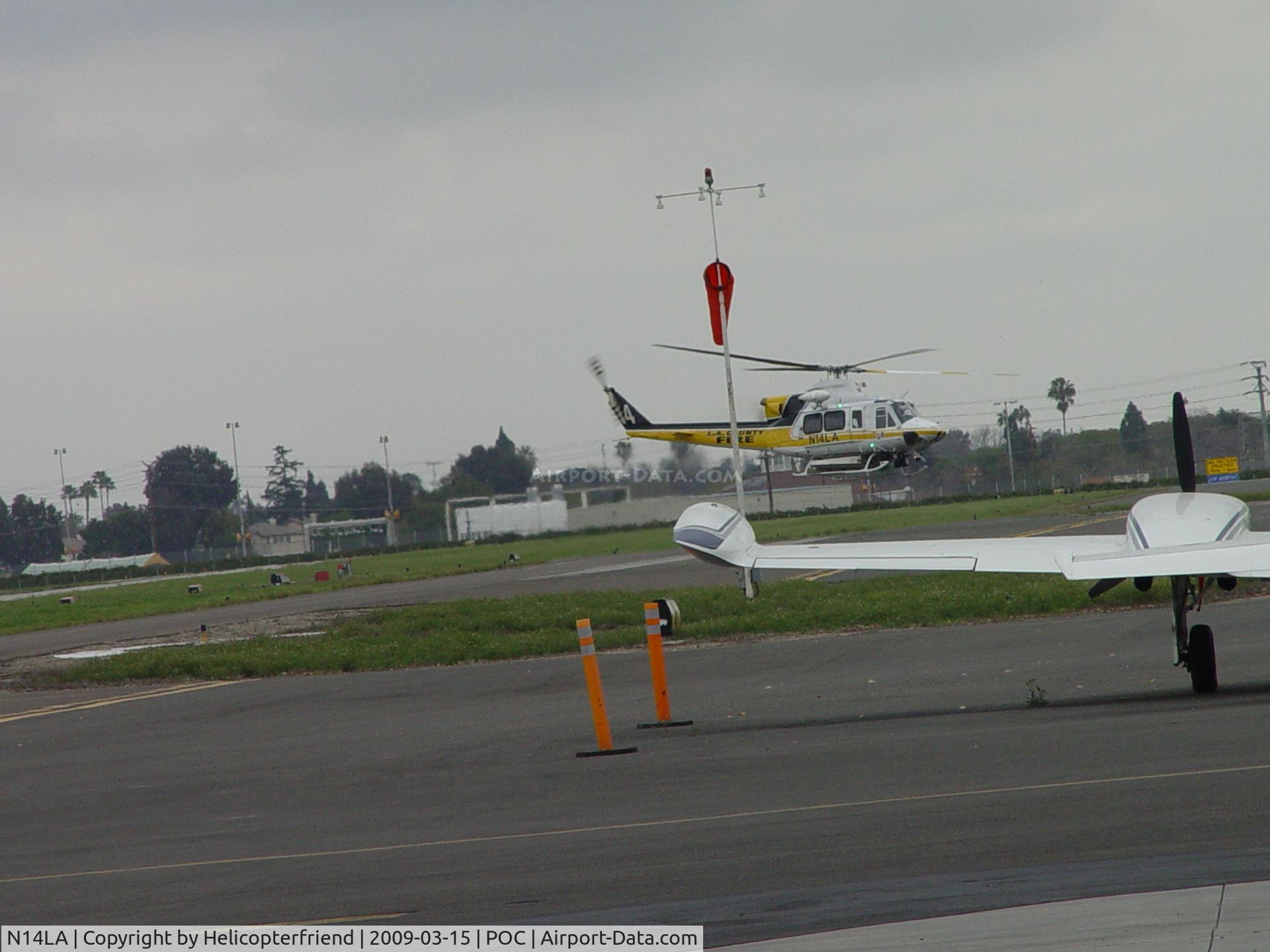 N14LA, 2005 Bell 412EP C/N 36393, Turning south for the heilpad