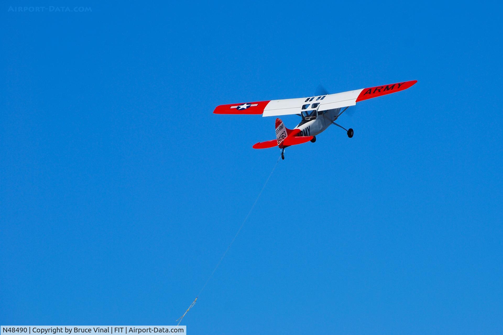 N48490, 1956 Cessna 305C (0-1E) C/N 24563, Banner Plane Hooks The Banner And Grabs Some Air