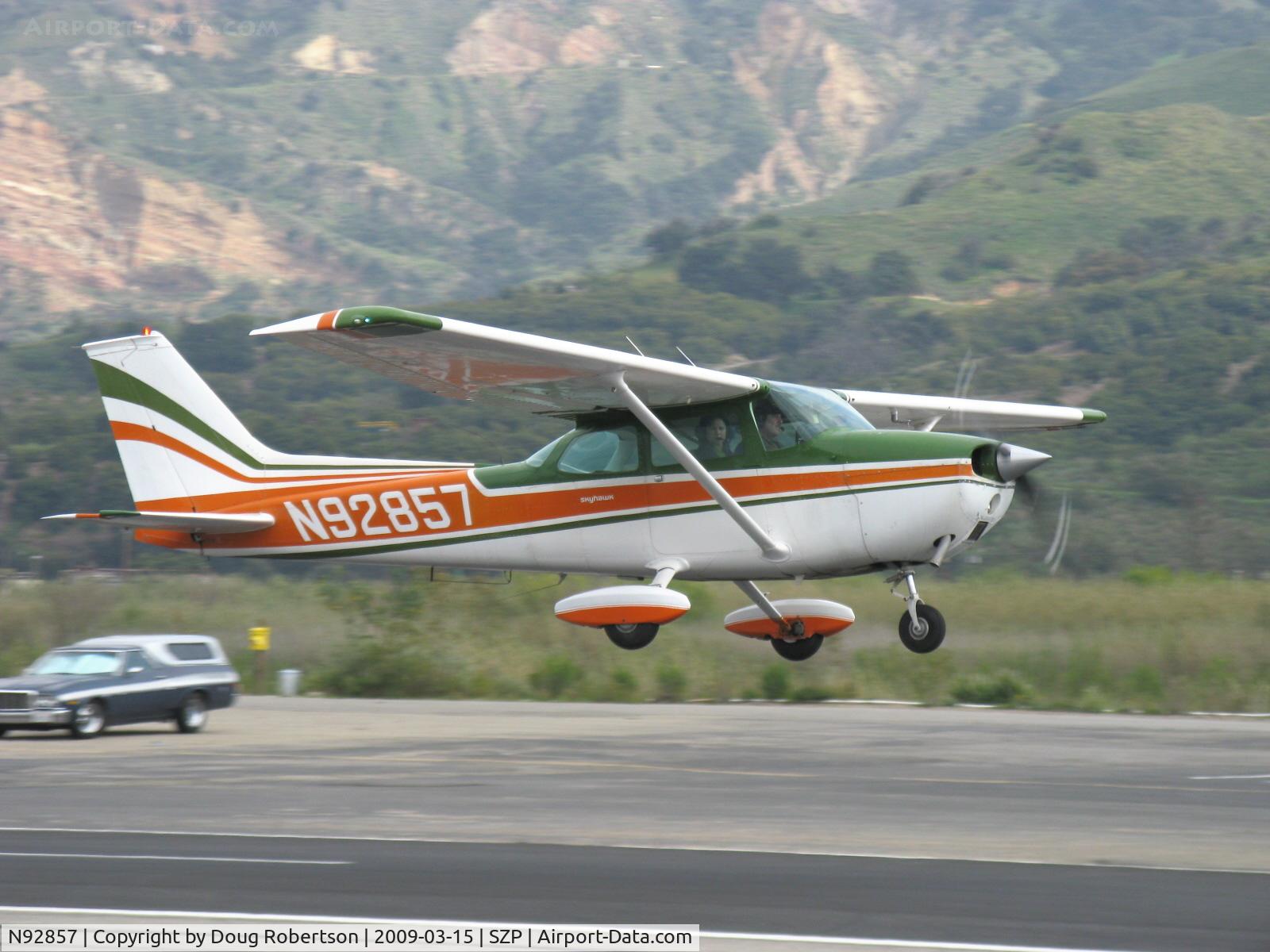 N92857, 1973 Cessna 172M C/N 17261635, 1973 Cessna 172M, Lycoming O-320-E2D 150 Hp, takeoff climb Rwy 22